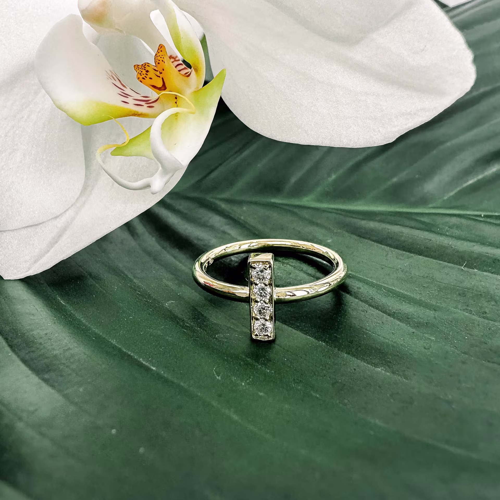 0.12 ctw Round Brilliant Man Made Diamonds set in 14 Karat Yellow Gold Bar Ring (Main View)