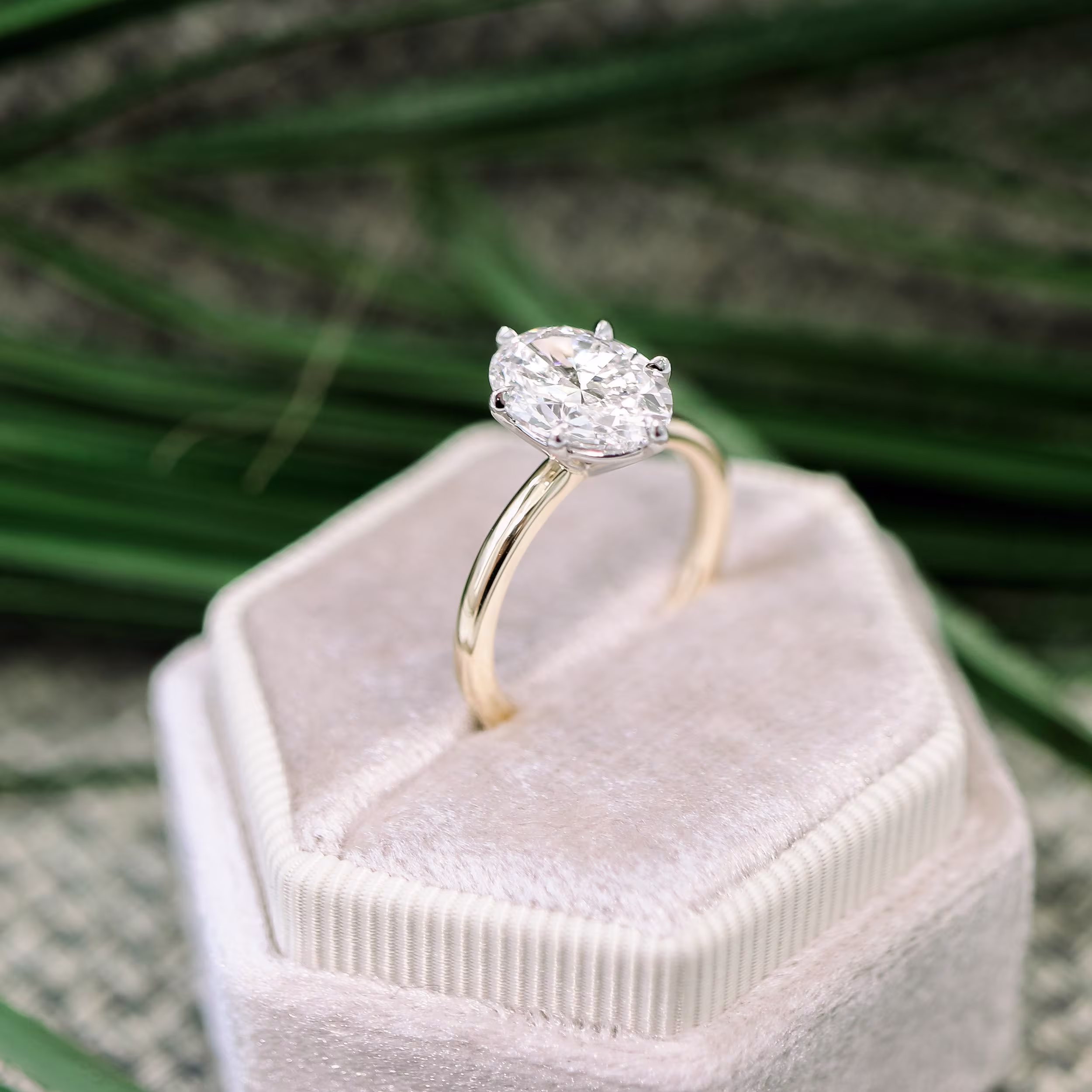 2.25 Carat Man Made Diamonds set in Platinum & 18kt Yellow Gold Oval Six Prong Solitaire (Profile View)