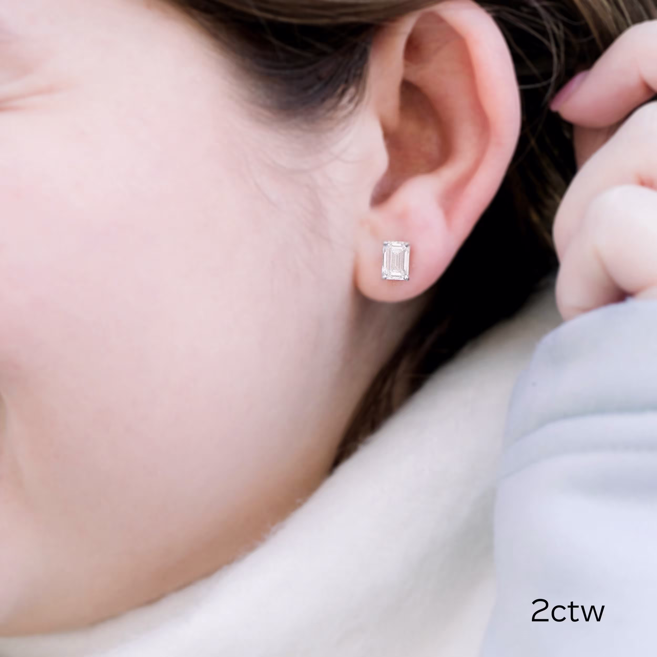 2 ctw white gold emerald cut stud earrings made with man made diamonds ada diamonds 003 on model