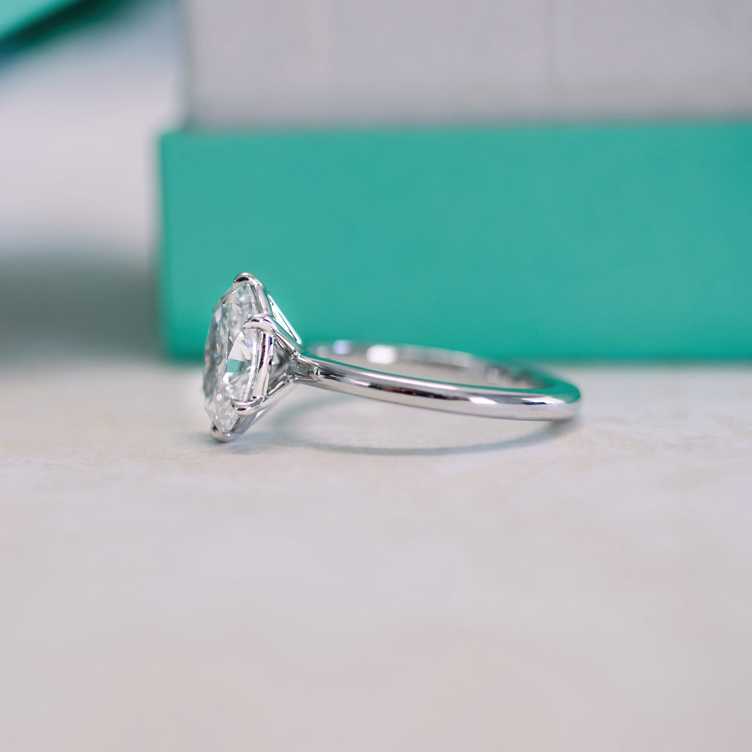 Platinum Oval Six Prong Solitaire Diamond Engagement Ring featuring 2.0 Carat Lab Diamonds (Side View)