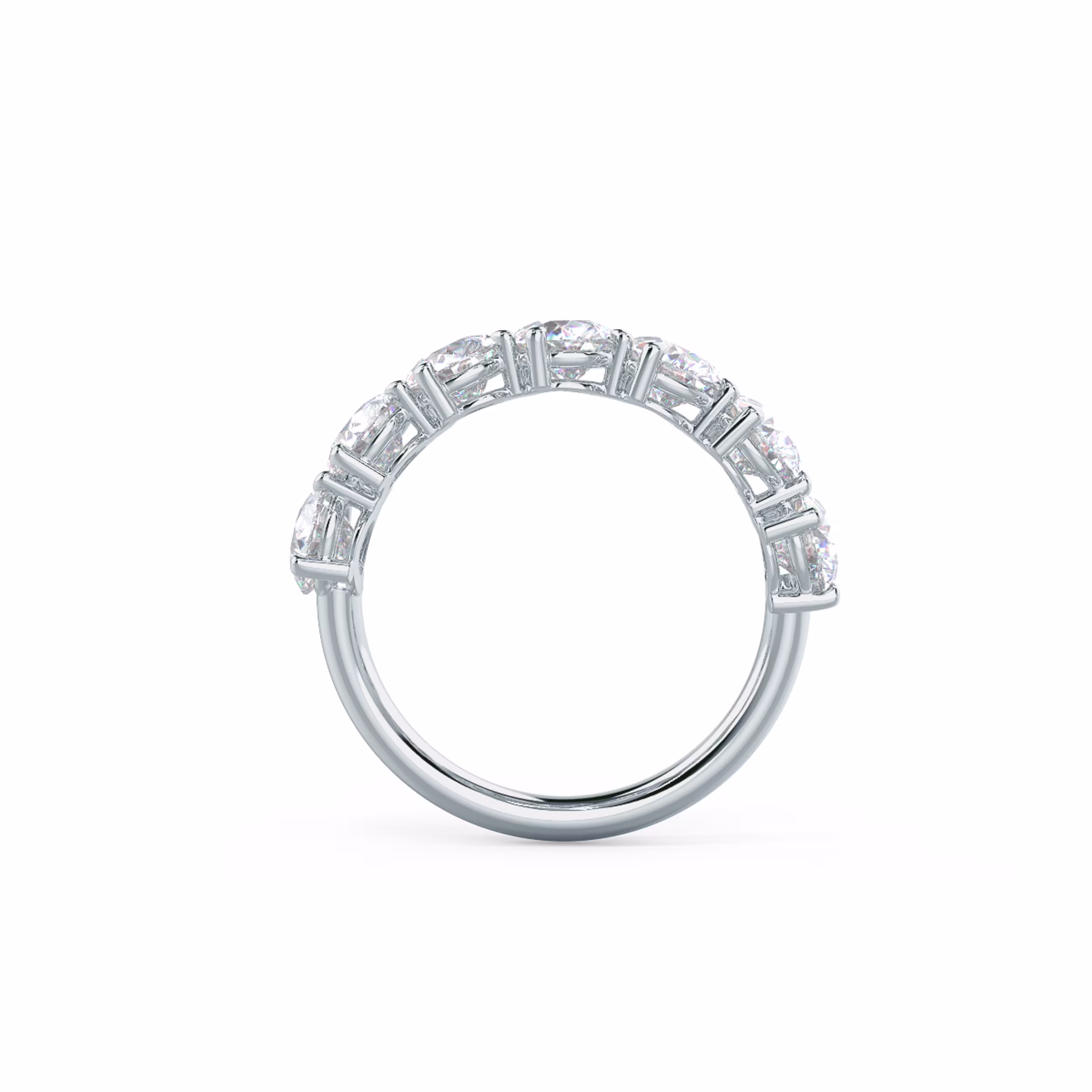 18 Karat White Gold Pear Angled Seven Stone featuring Exceptional Quality 3.5 ct Diamonds (Profile View)