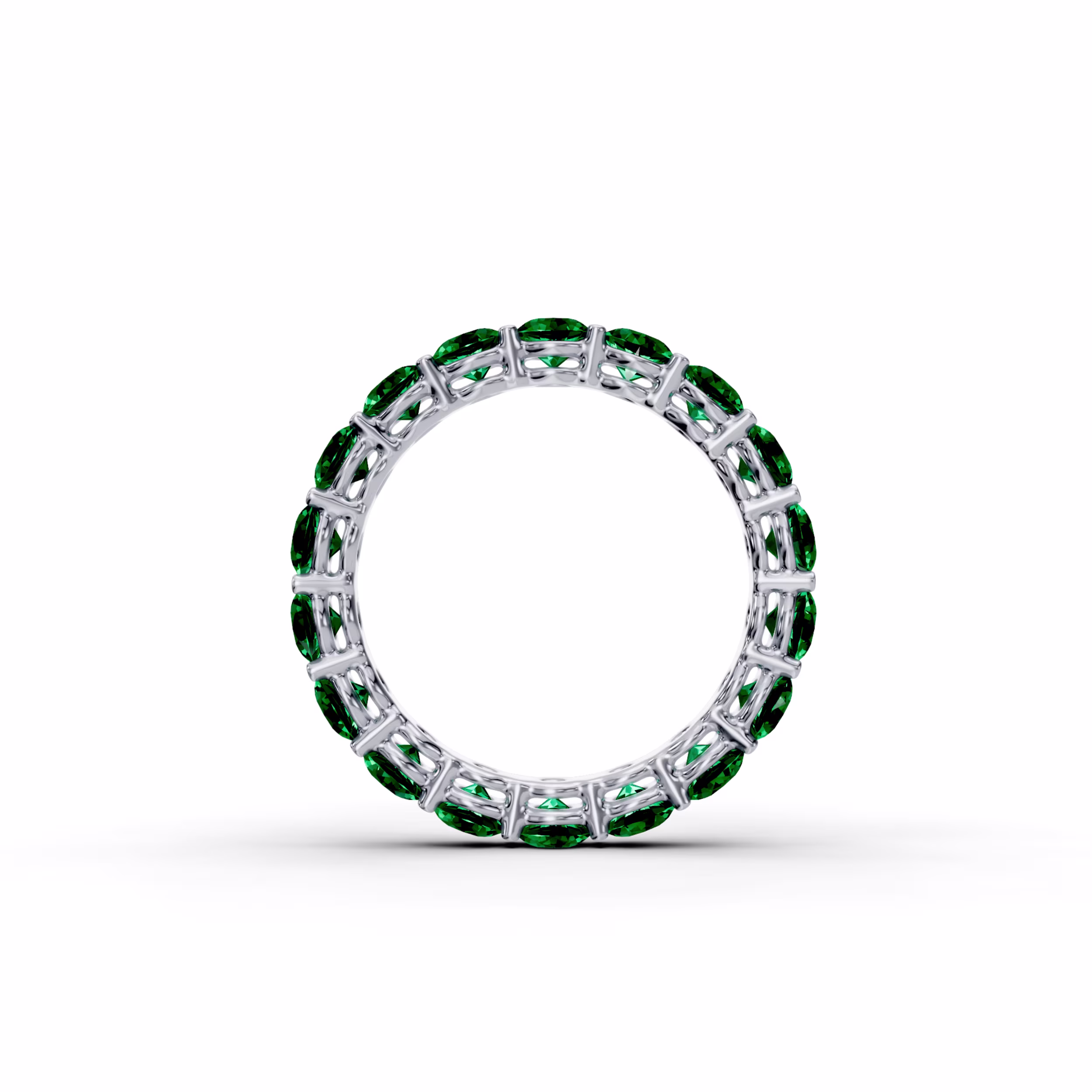 Platinum 3ctw Round Emerald Prong Set Eternity Band in Platinum (Profile View)