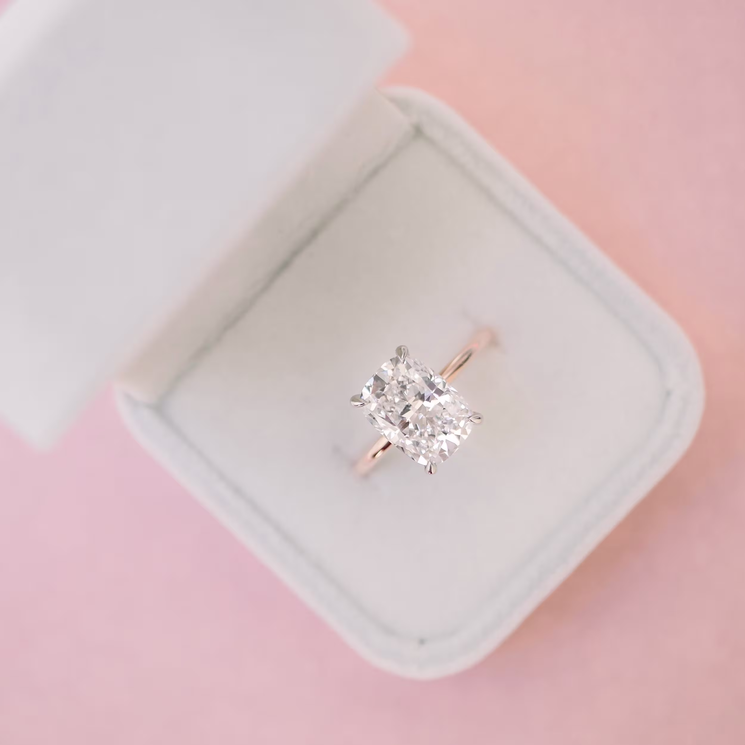 Platinum & Rose Gold Cushion Petite Four Prong Solitaire Diamond Engagement Ring featuring 4.75 Carat Diamonds (Main View)