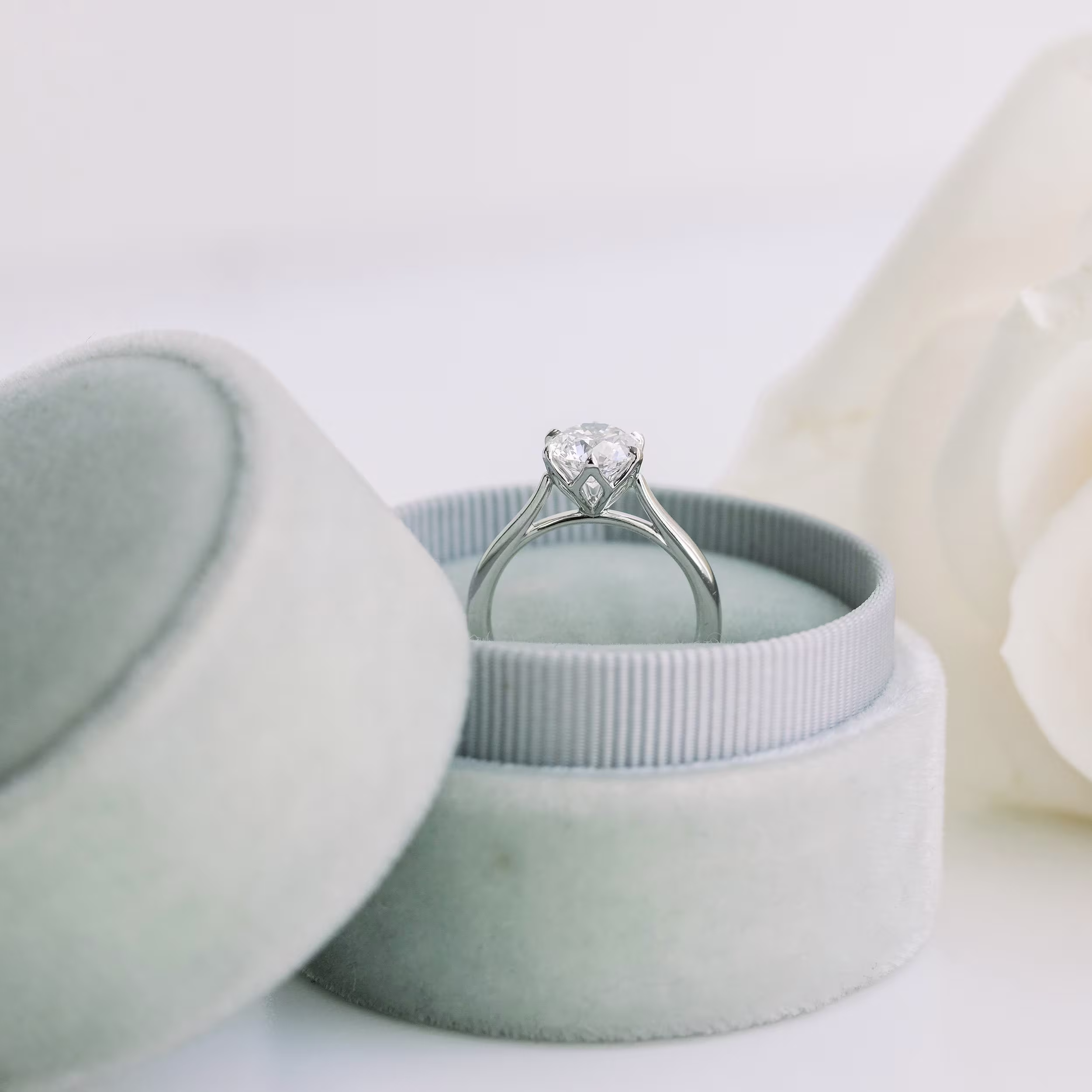 Platinum Floral Basket Solitaire Diamond Engagement Ring featuring 1.5 ctw Lab Created Diamonds (Profile View)