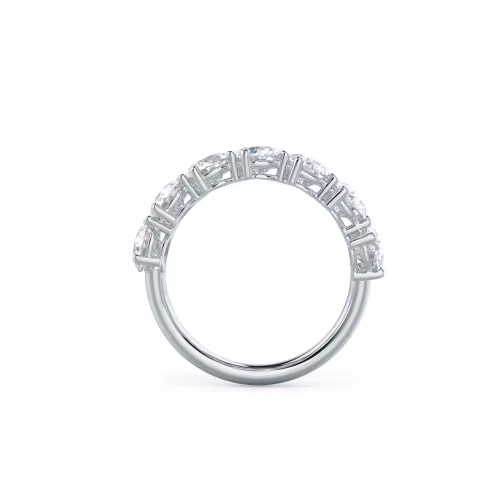 18 Karat White Gold Pear Angled Seven Stone featuring Exceptional Quality 3.5 ct Diamonds (Profile View)