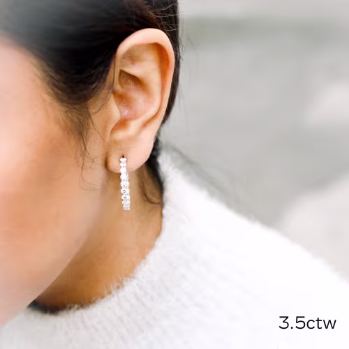 three and a half carat lab diamond large inside out hoop earrings on model ada diamonds design ad 009