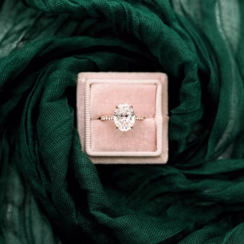 14k Rose Gold Oval Cathedral Pavé Engagement Ring with Hidden Halo Featuring Lab Diamonds Ada Diamonds Design AD190 Profile View in Box