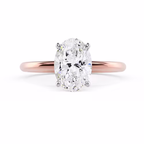 High Quality Man Made Diamonds set in Rose Gold Oval Classic Four Prong Solitaire Diamond Engagement Ring (Main View)