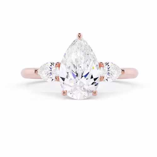 Diamonds set in Rose Gold Pear Three Stone Diamond Engagement Ring (Main View)
