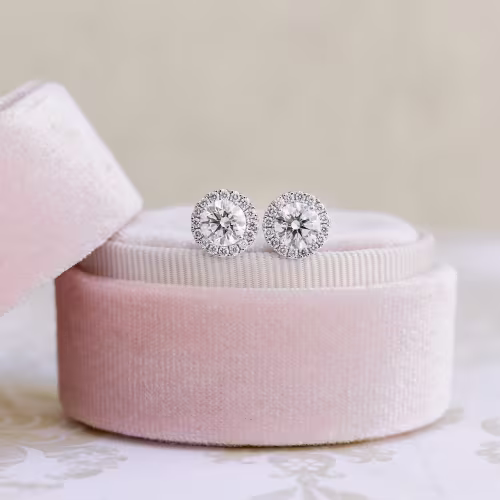 Round Brilliant Diamonds set in White Gold Diamond Single Halo Round Stud Earrings (Main View)