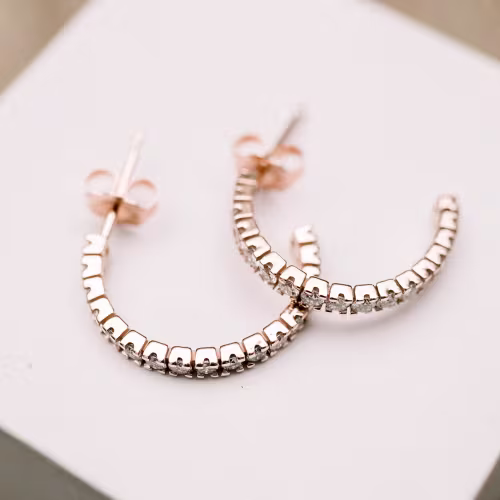 Exceptional Quality 0.7 Carat Round Diamonds set in 14k Rose Gold Classic J Hoop Diamond Earrings (Profile View)