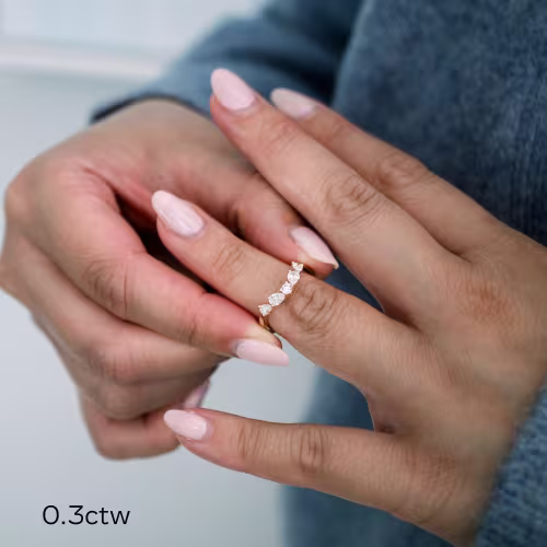 18k rose gold custom nesting band with round and pear lab diamonds design ad 182 on model