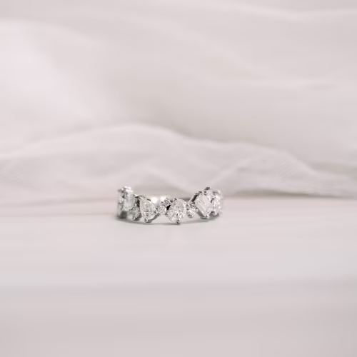 platinum multi shape wedding band with oval, pear, princess, round, emerald cut lab diamonds ada diamonds design ad 272 macro