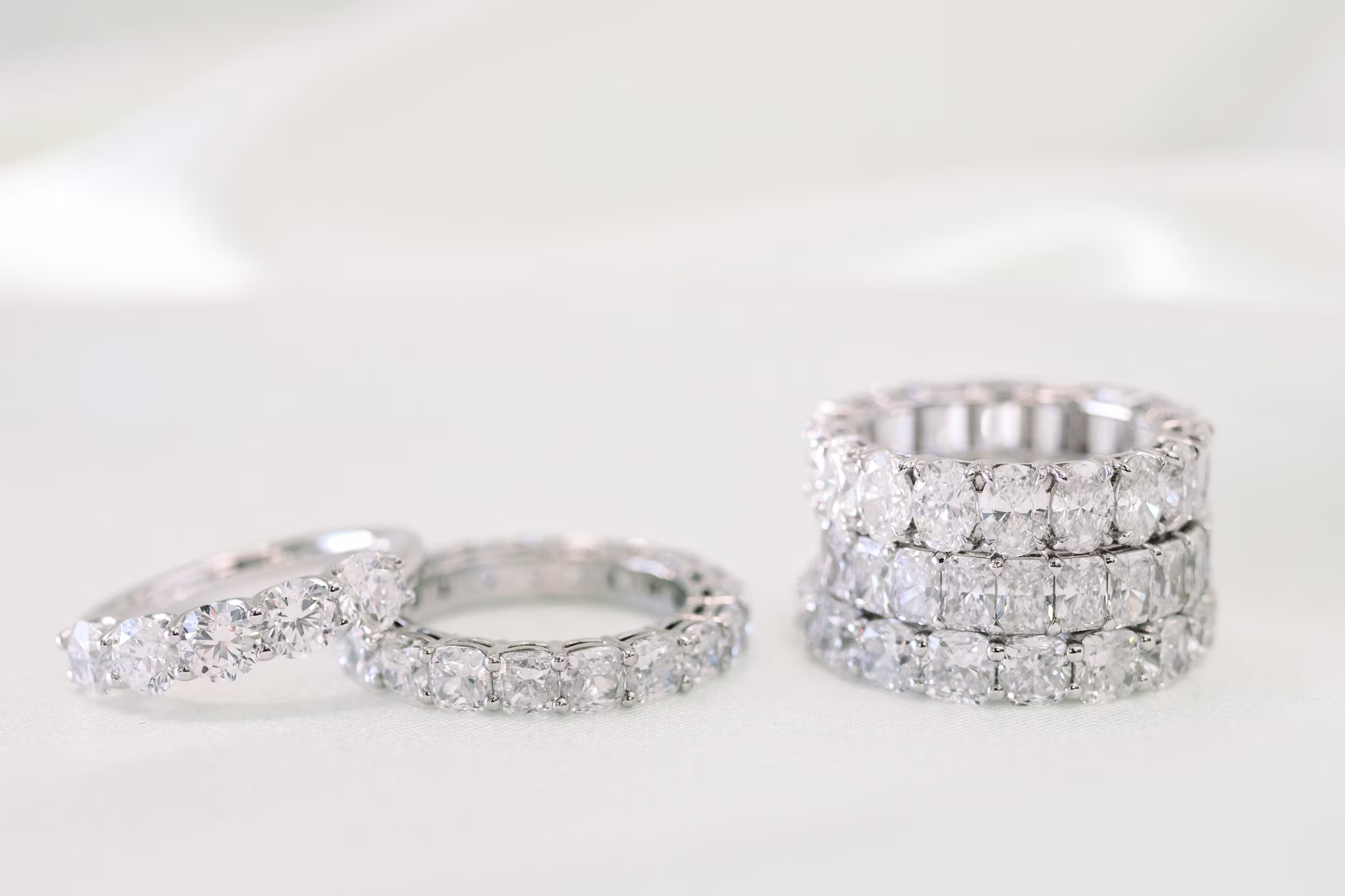 Oval Diamond French U Eternity Band featuring Diamonds (Profile View)