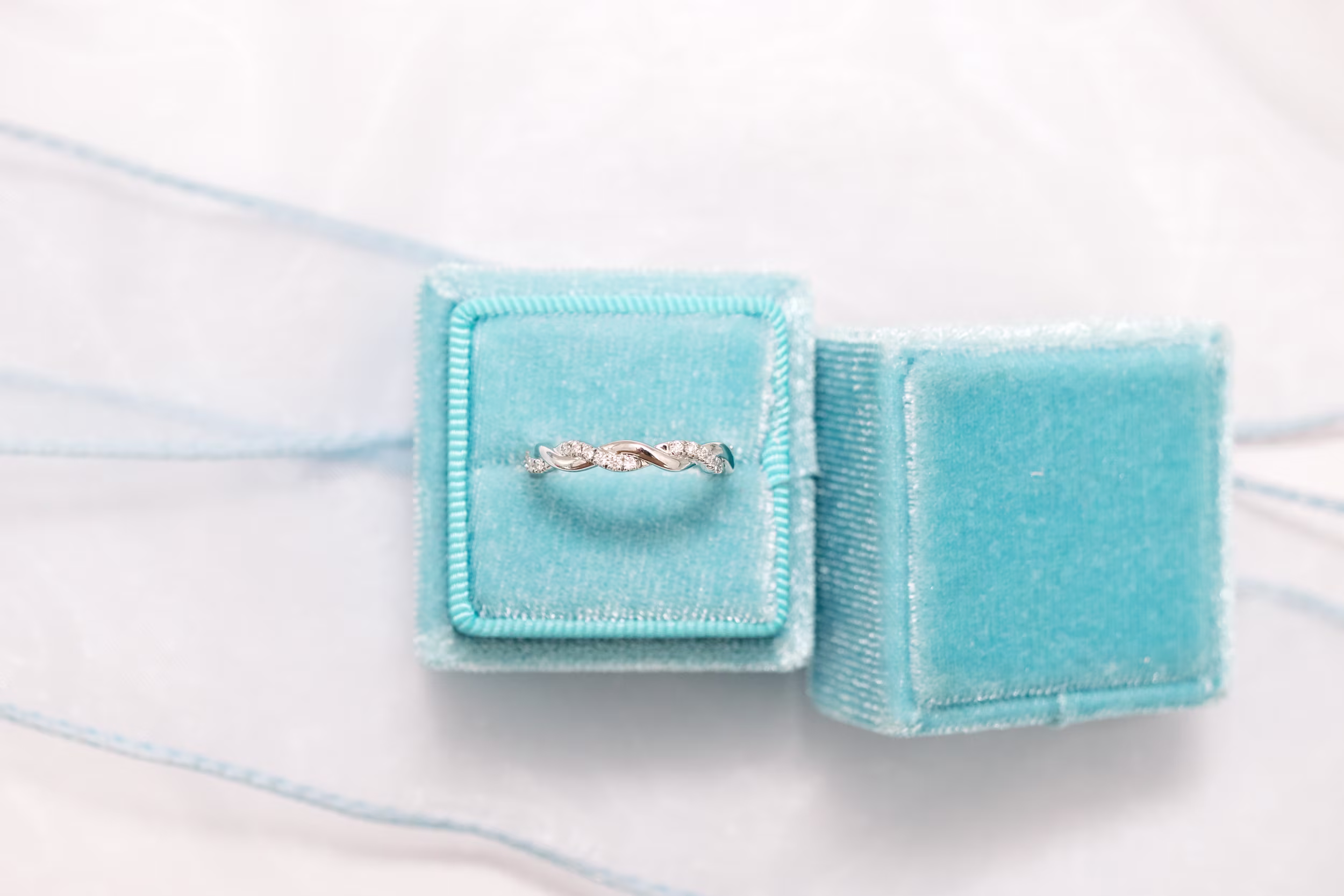 High Quality 0.3 ct Round Created Diamonds Infinity Twisting Light Three Quarter Band in Platinum (Main View)