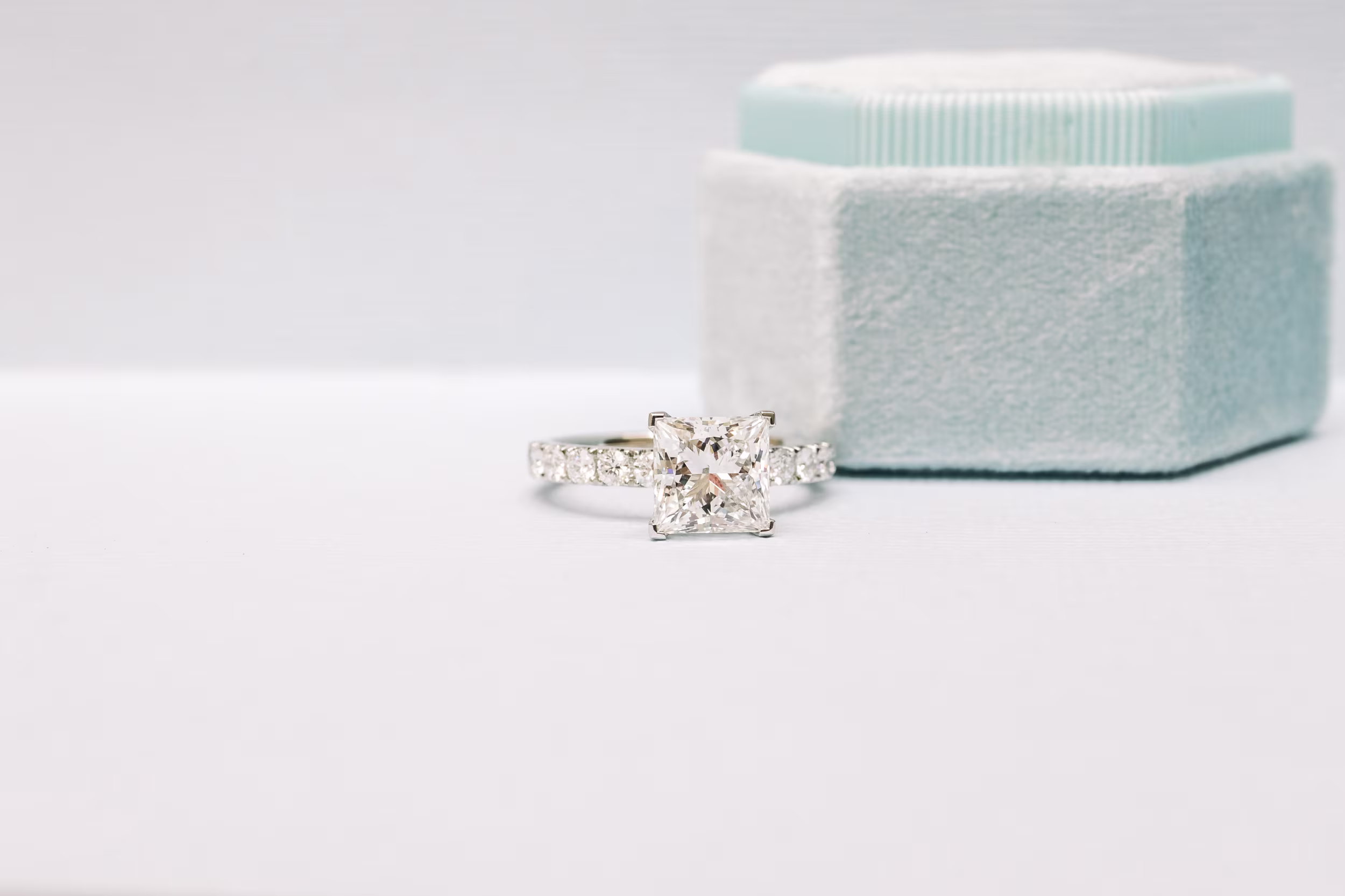 Princess Petite Four Prong Pavé Diamond Engagement Ring featuring Lab Created Diamonds (Profile View)