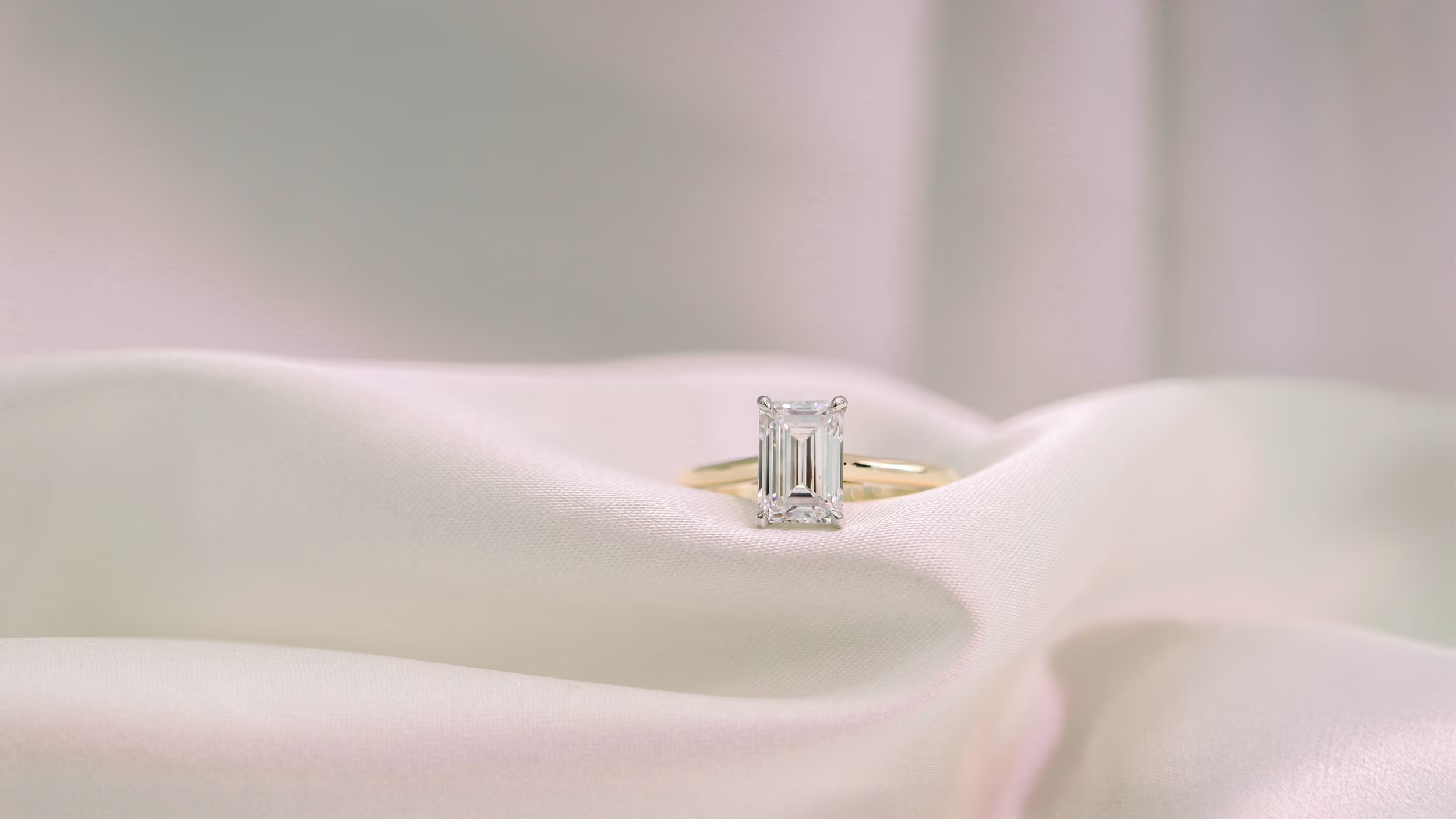 Emerald Cathedral Solitaire Diamond Engagement Ring featuring Man Made Diamonds (Profile View)