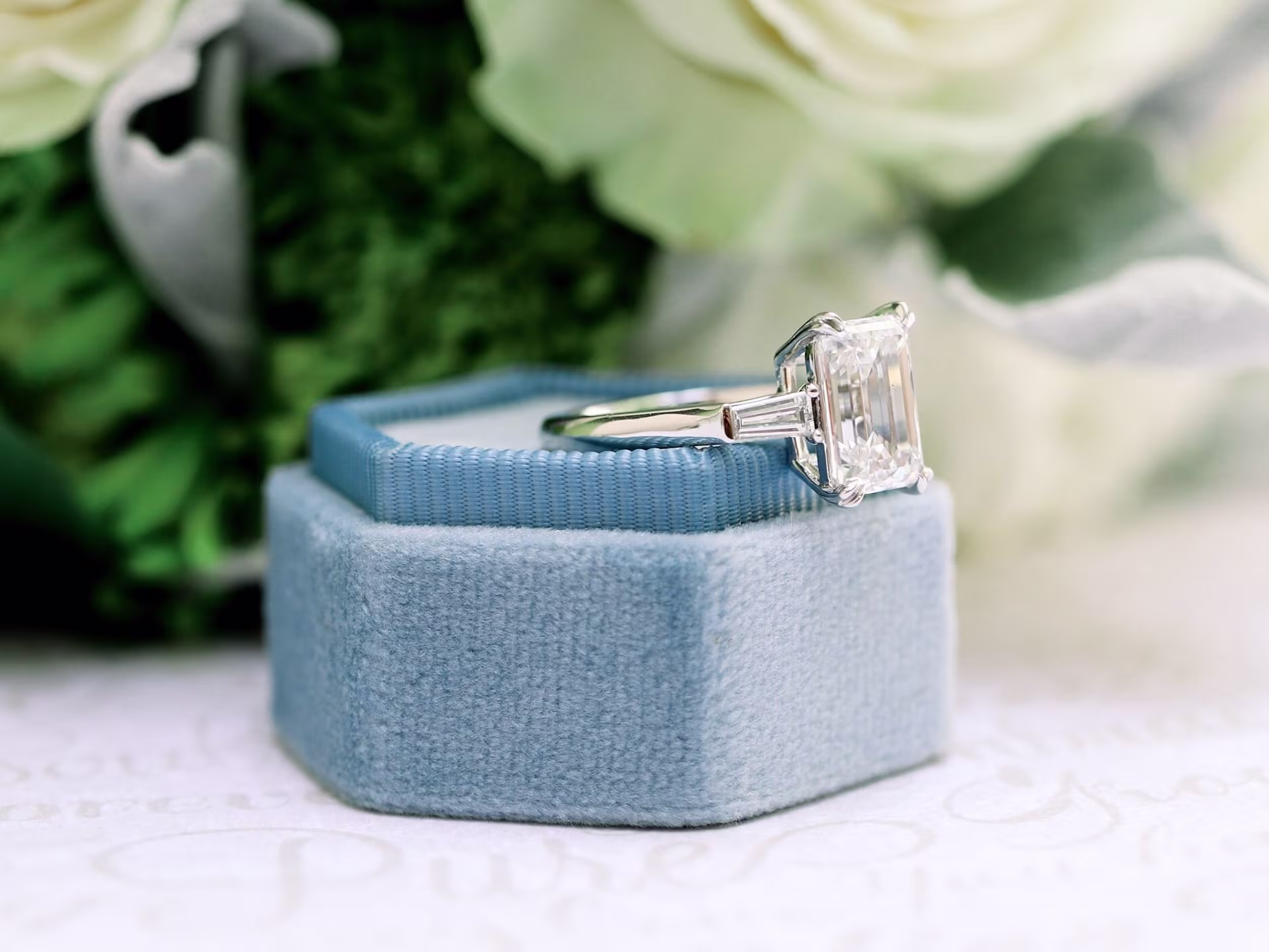 3.5 carat emerald cut three stone lab diamond engagement ring in platinum Ada Diamonds design ad 278 macro shot