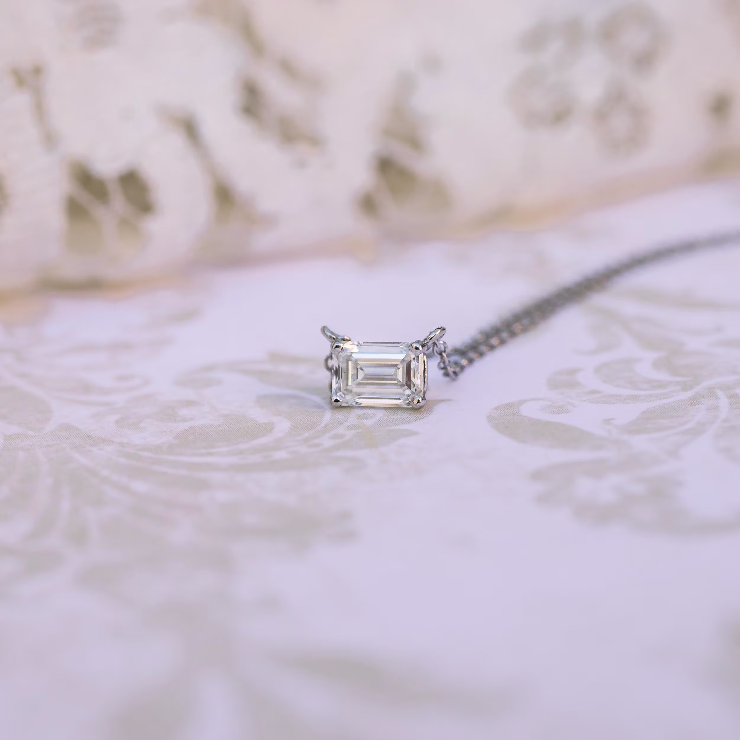 platinum lab diamond east west emerald cut pendant ada diamonds design ad 298