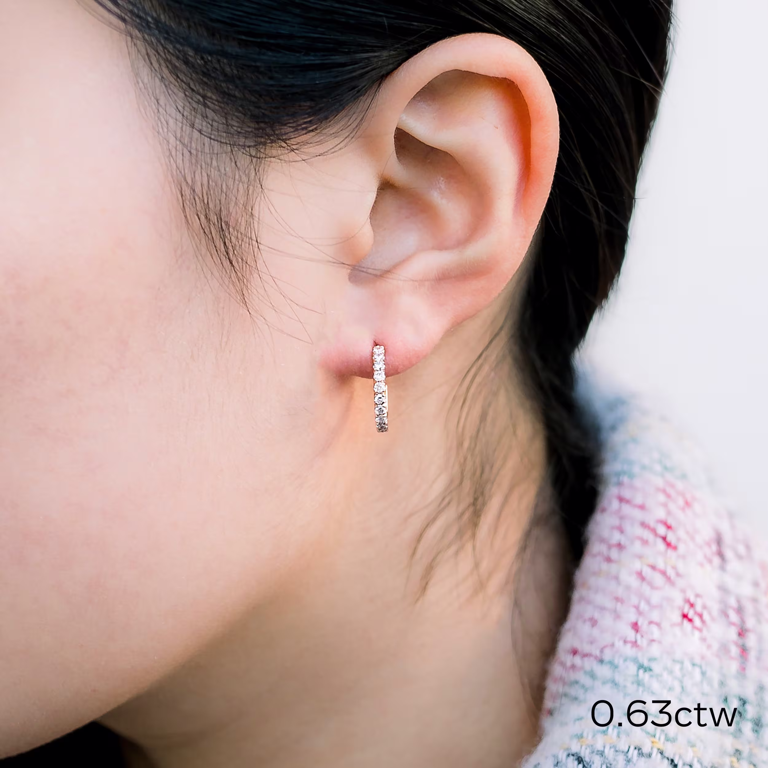 0.63 carat total weight J Huggie Hoop earrings in rose gold made with man made diamonds ADA Diamonds ad 325