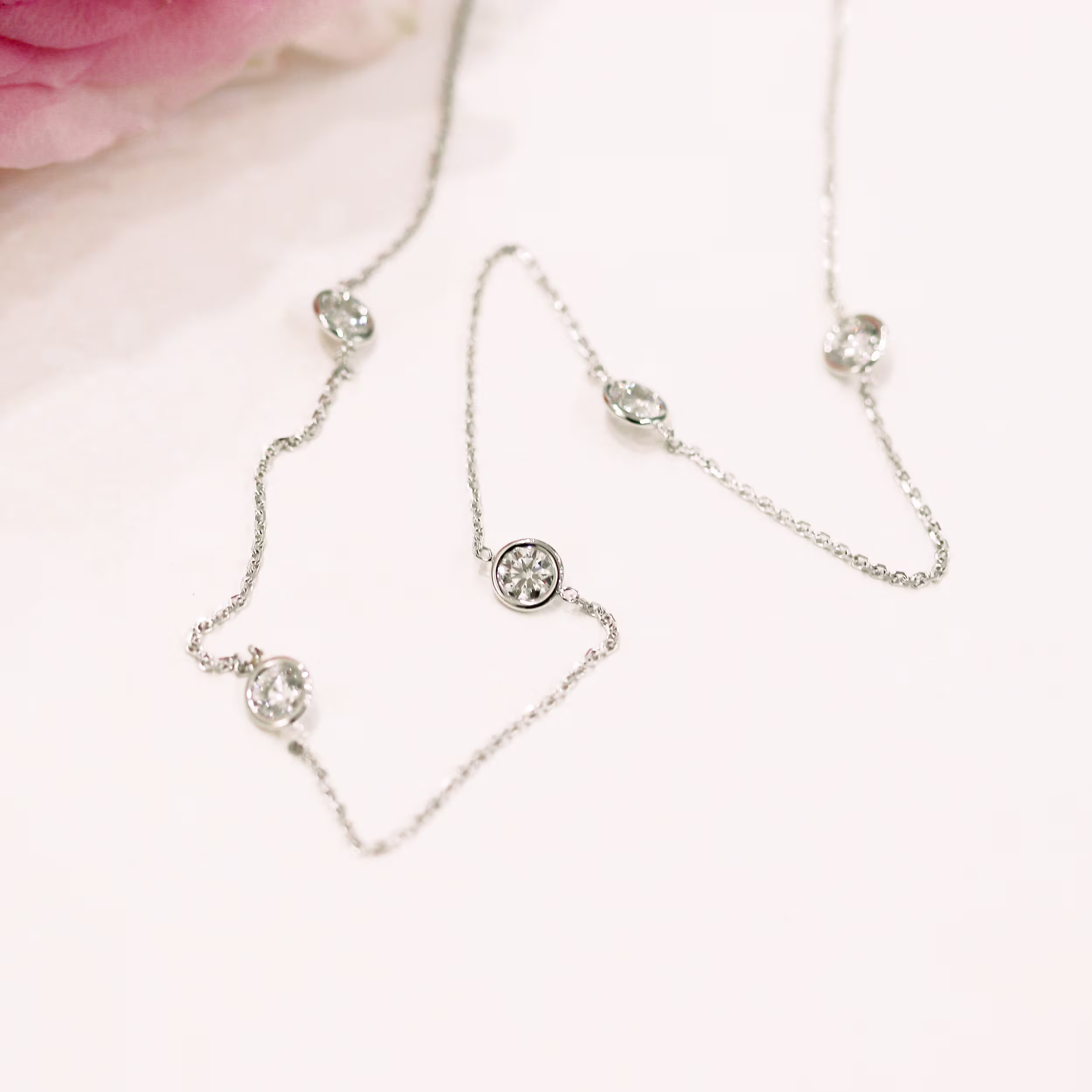 Round Man Made Diamonds set in White Gold Five Diamond Station Necklace