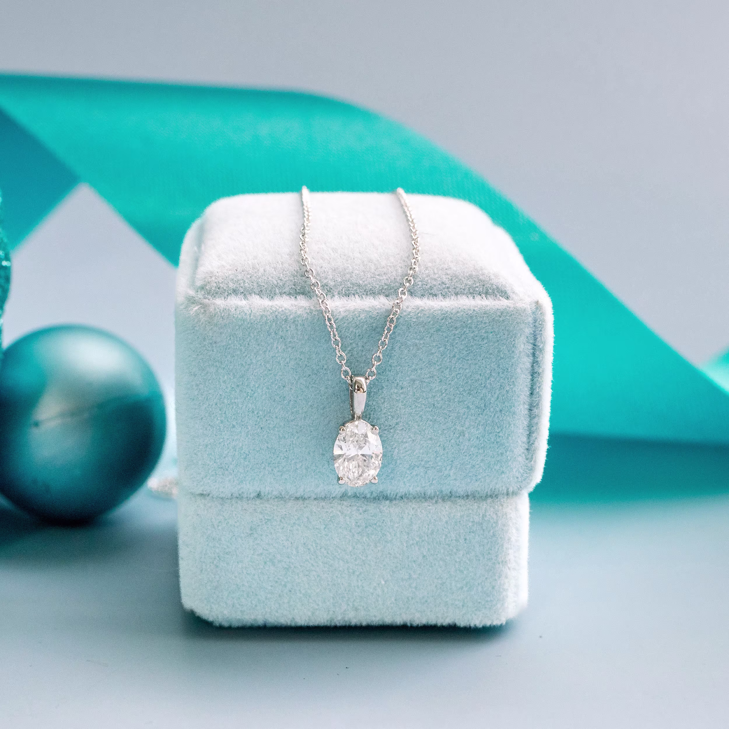 0.7 Carat Synthetic Diamonds set in 14k White Gold Classic Oval Pendant (Main View)