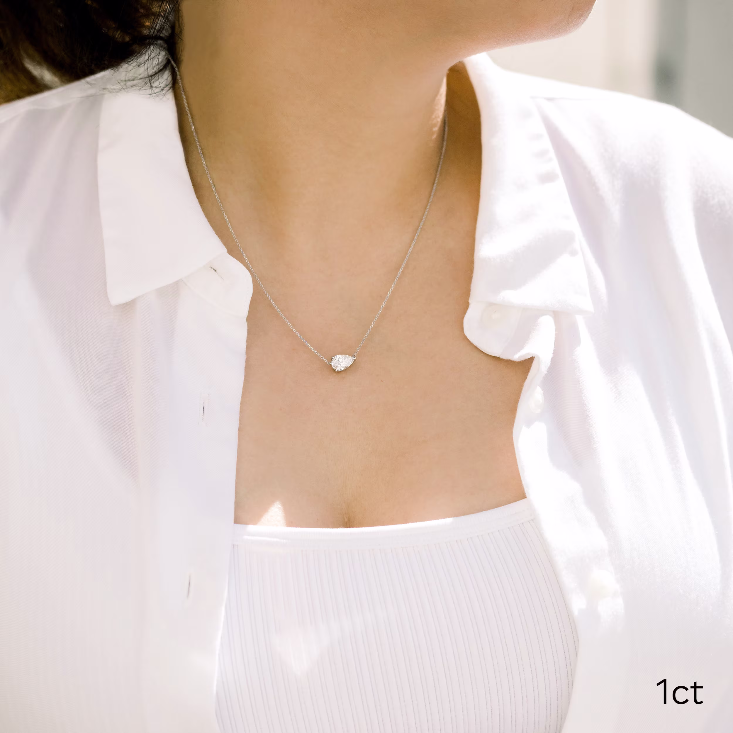 1.0 ct Created Diamonds set in 14k White Gold Floating Pear Pendant (Main View)