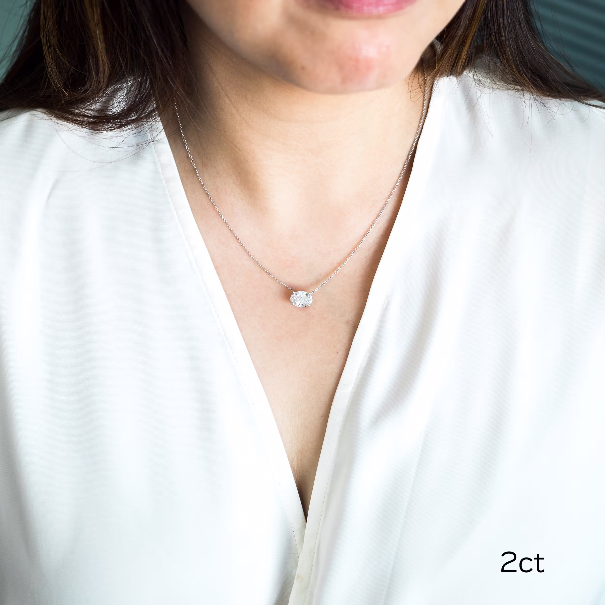 Exceptional Quality 2.0 Carat Synthetic Diamonds set in 14k White Gold East-West Oval Diamond Pendant (Main View)