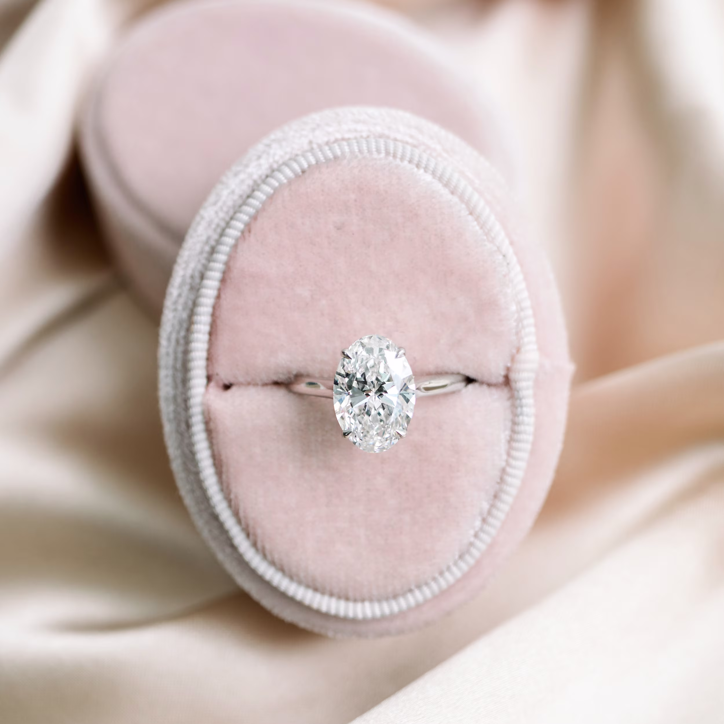 Platinum Oval Cathedral Solitaire Diamond Engagement Ring featuring 3.0 Carat Created Diamonds (Main View)