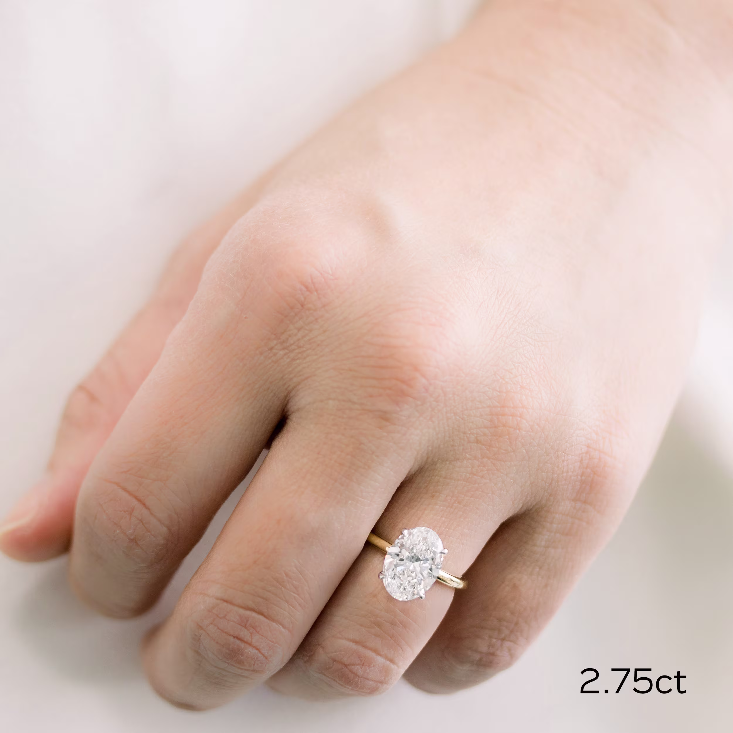 Platinum & Yellow Gold Oval Classic Four Prong Solitaire Diamond Engagement Ring featuring High Quality 2.75 ct Lab Created Diamonds (Main View)