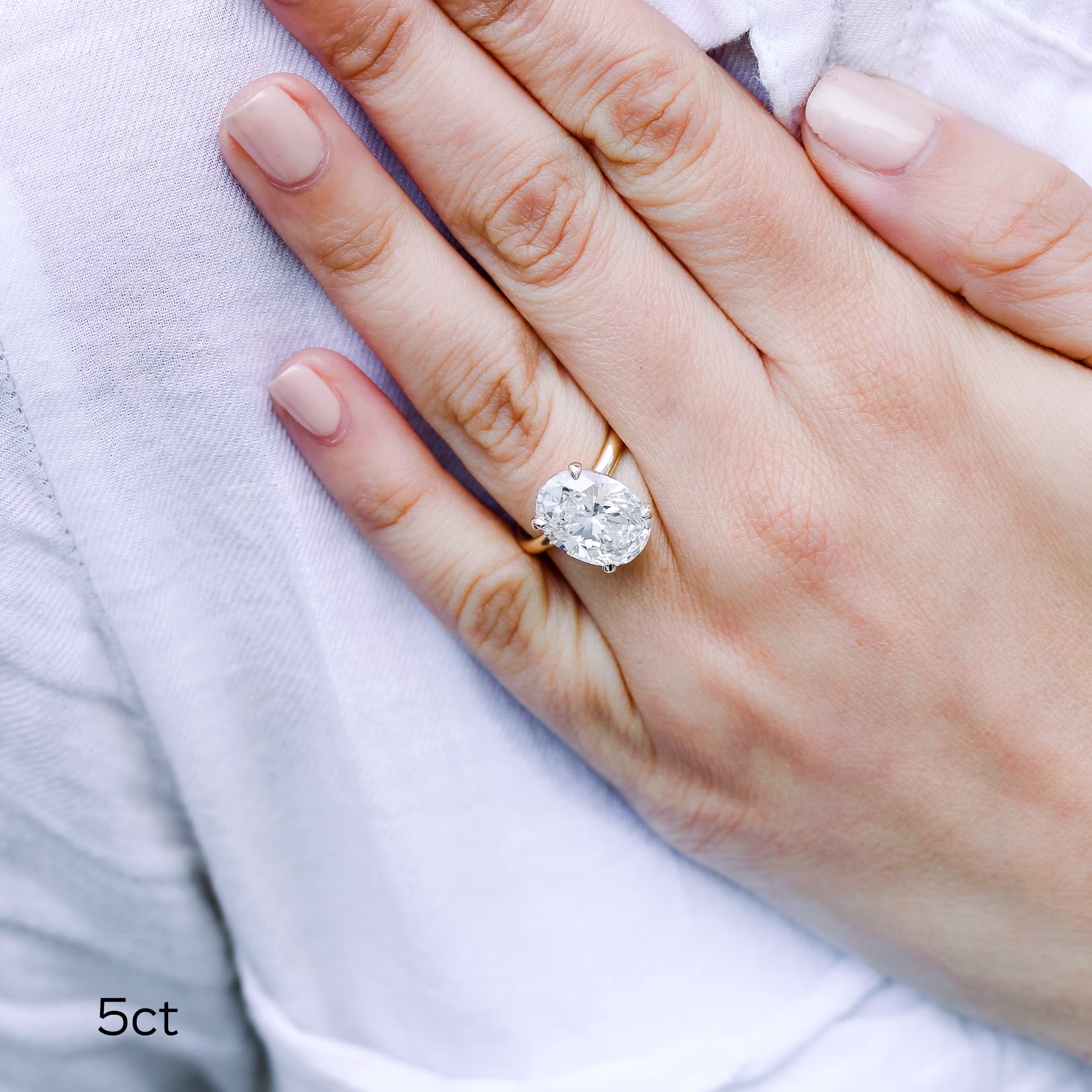 Yellow Gold Oval Petite Four Prong Solitaire featuring 5.0 ct Lab Diamonds (Main View)