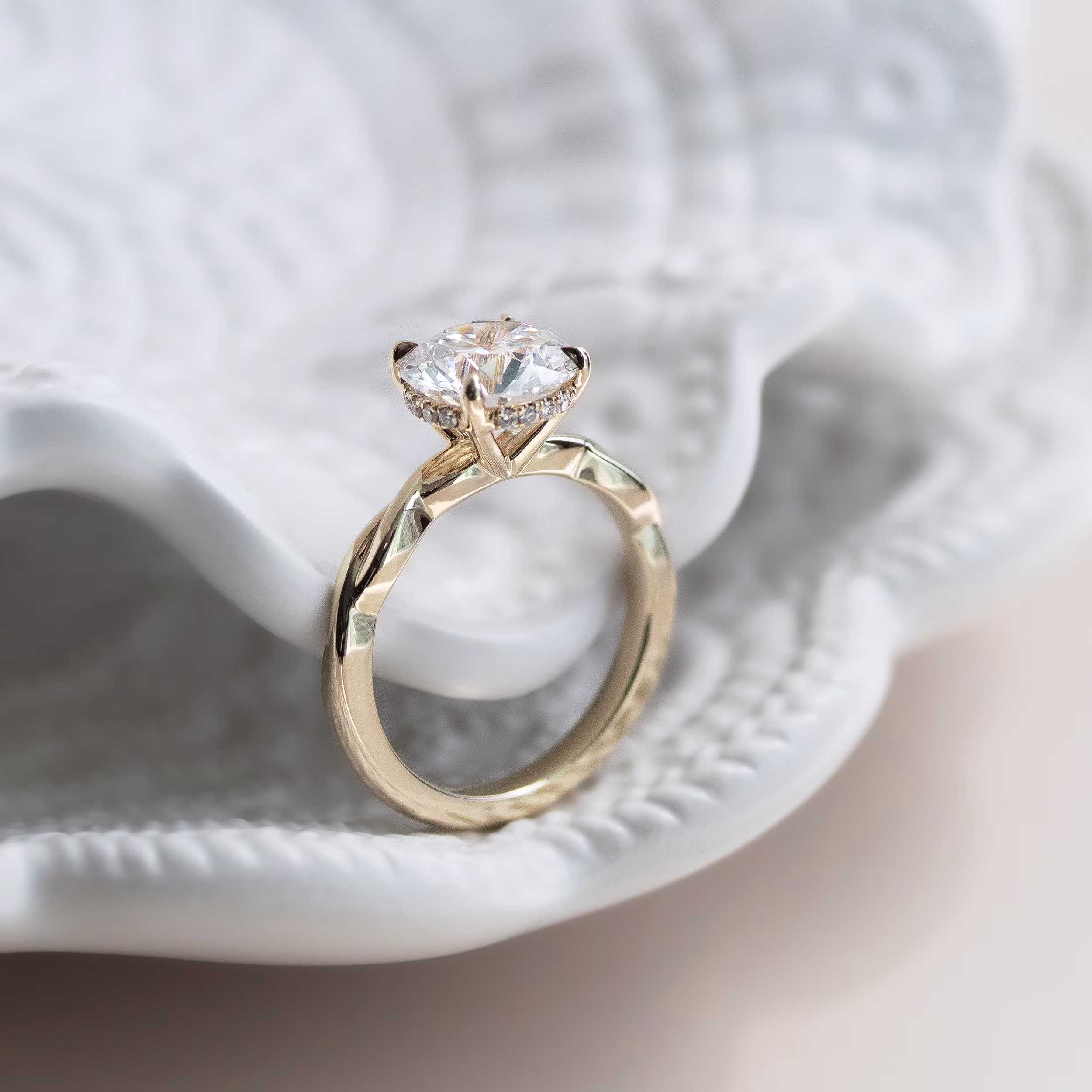 Yellow Gold Twisting Band Solitaire featuring 2.0 Carat Diamonds (Profile View)