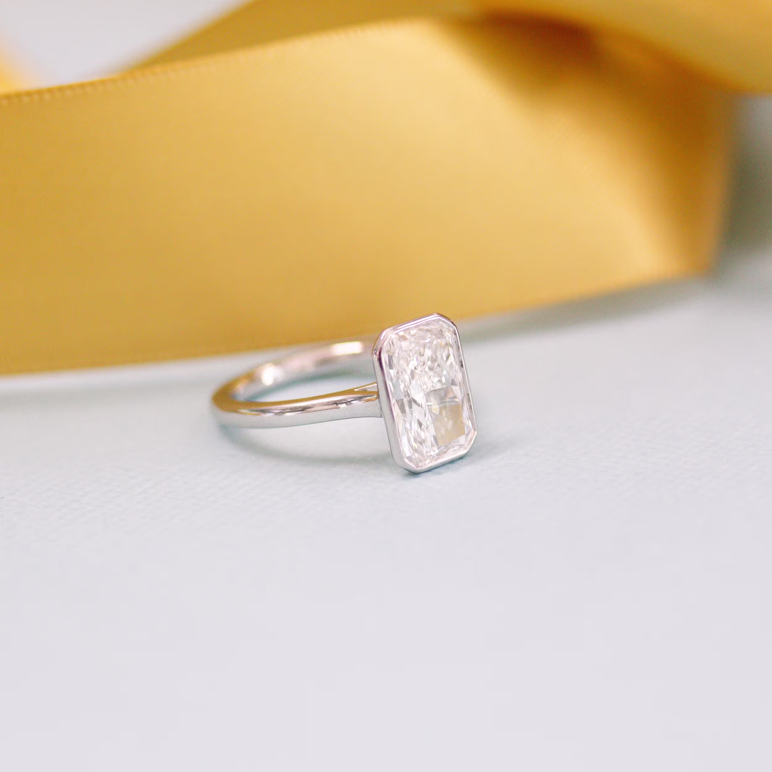 3.0 Carat Lab Diamonds Bezel Solitaire Diamond Engagement Ring in Platinum (Side View)