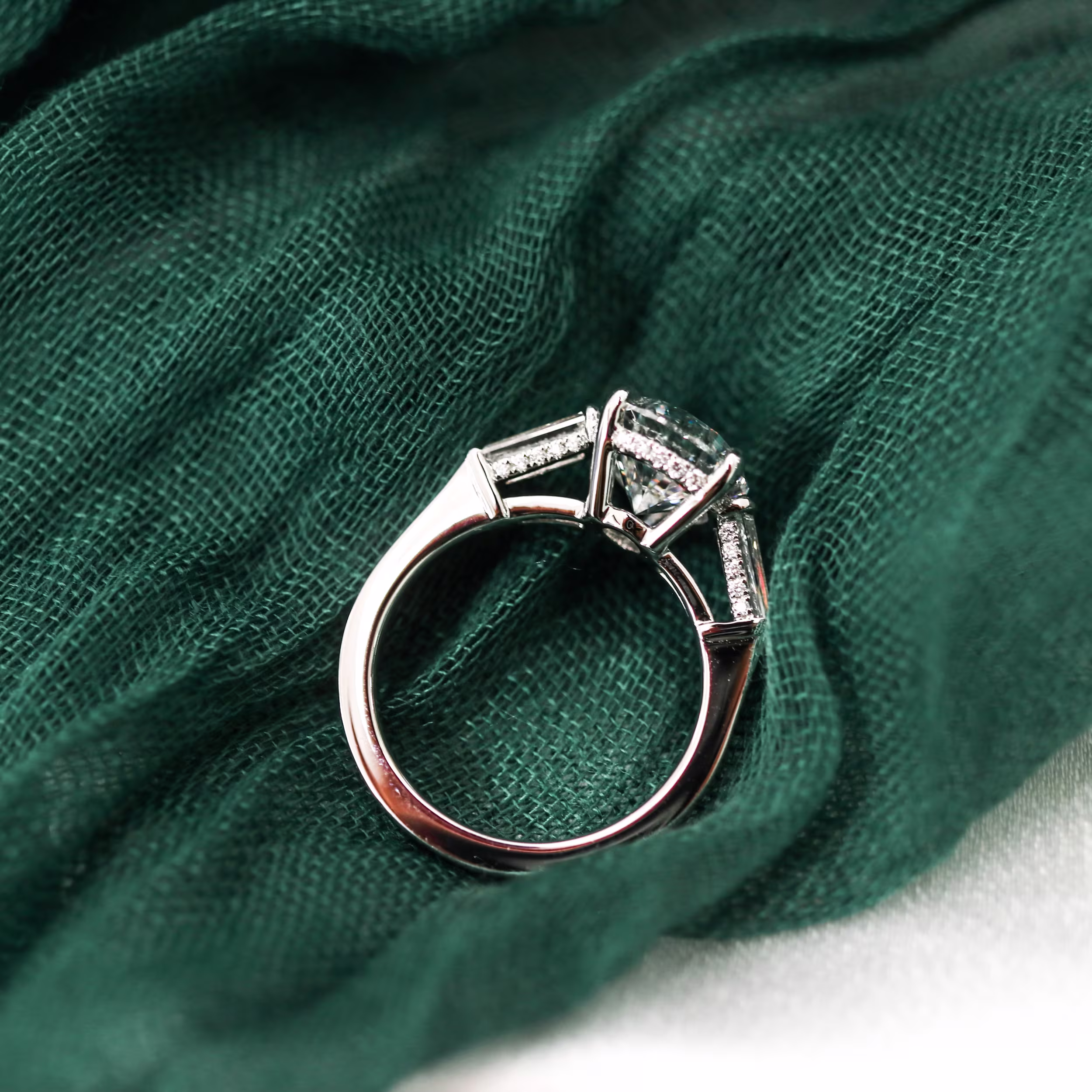 Platinum Pear and Baguette Setting featuring High Quality 3.75 Carat Lab Diamonds (Profile View)