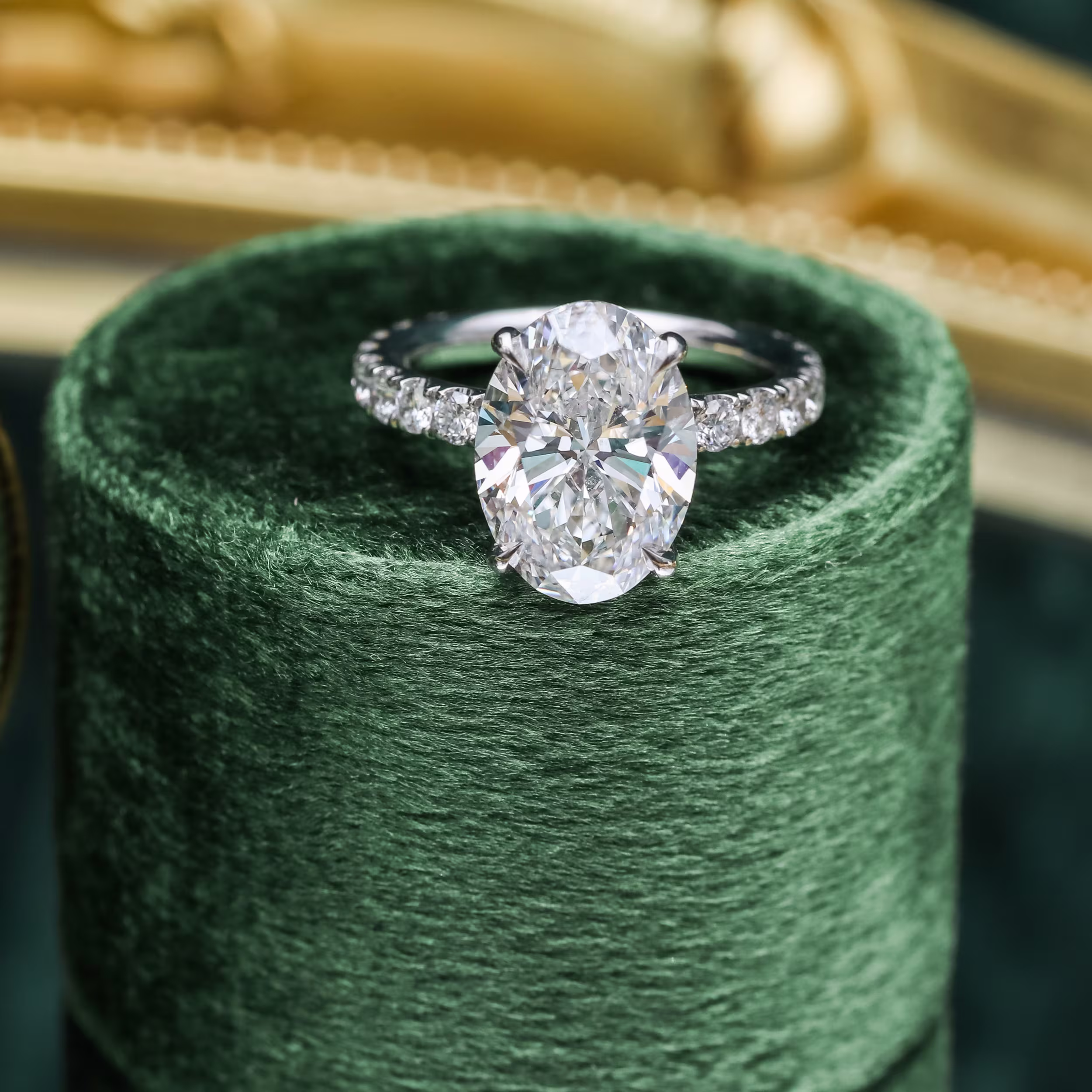 Exceptional Quality 4.25 Carat Lab Diamonds Oval Petite Four Prong Pavé Setting in Platinum (Main View)