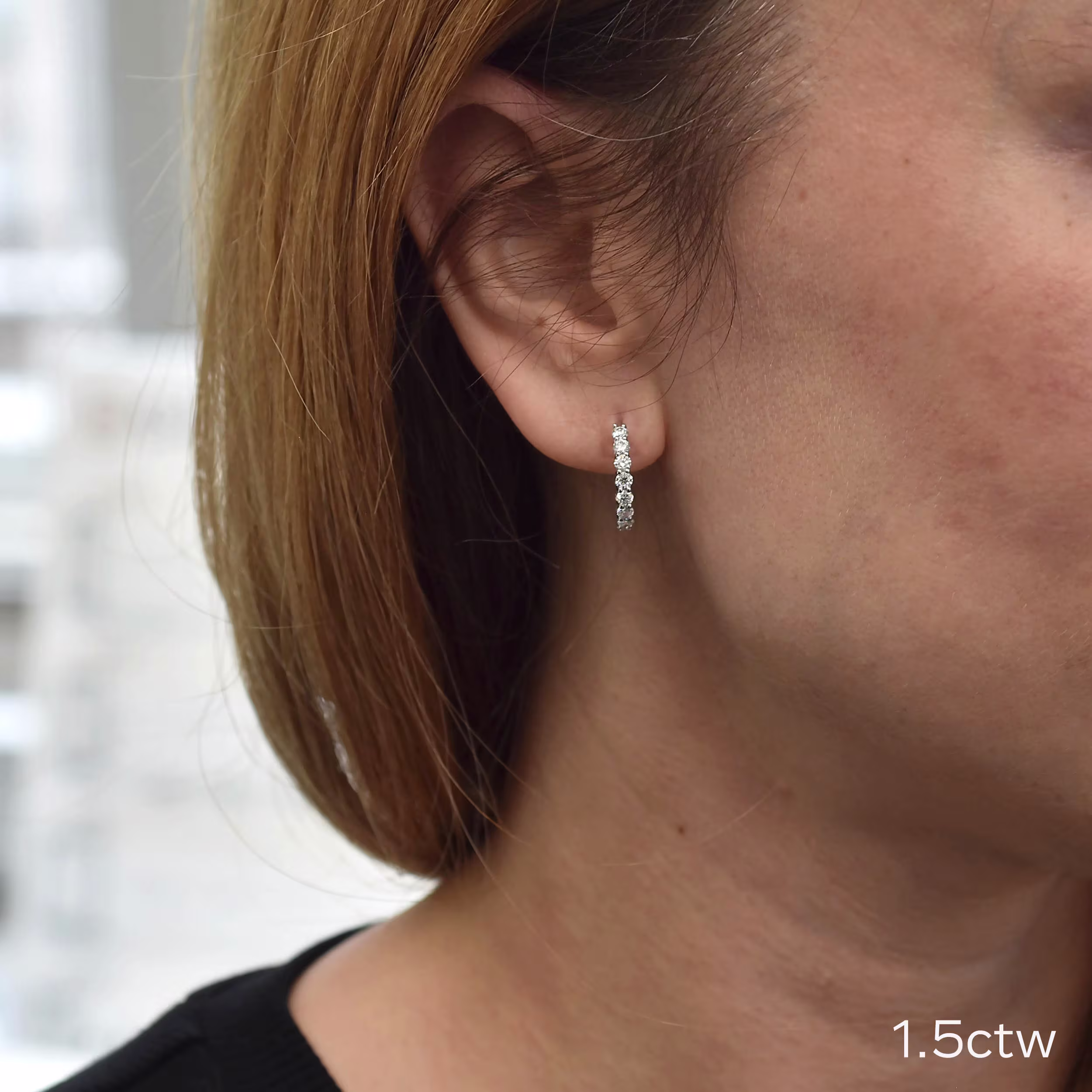 14kt White Gold Prong-Set Huggie Hoop Earrings featuring Exceptional Quality 1.5 Carat Round Brilliant Synthetic Diamonds (Main View)