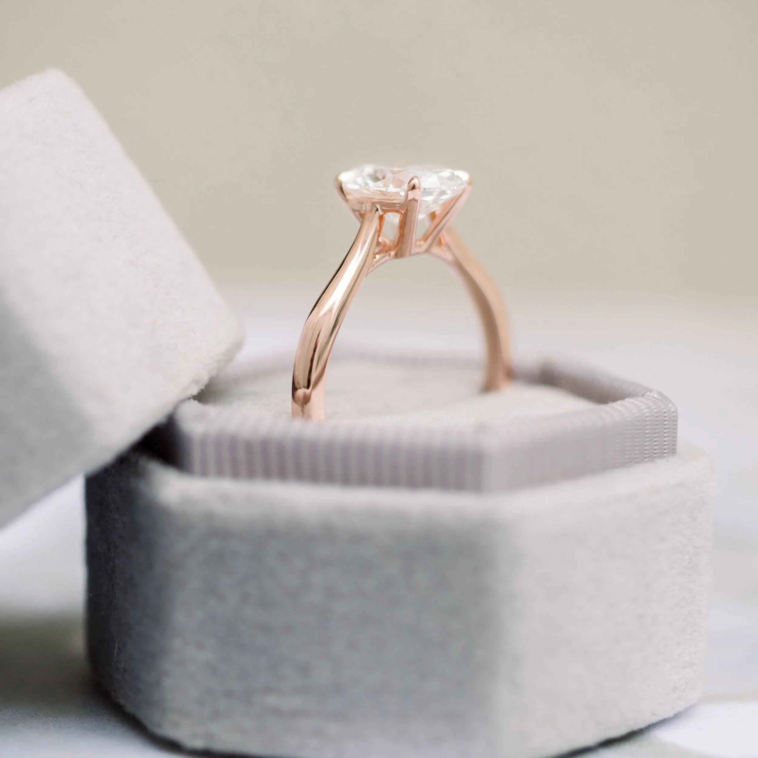 1.5 Carat Diamonds set in 14k Rose Gold Open Tapered Cathedral Solitaire Diamond Engagement Ring (Side View)