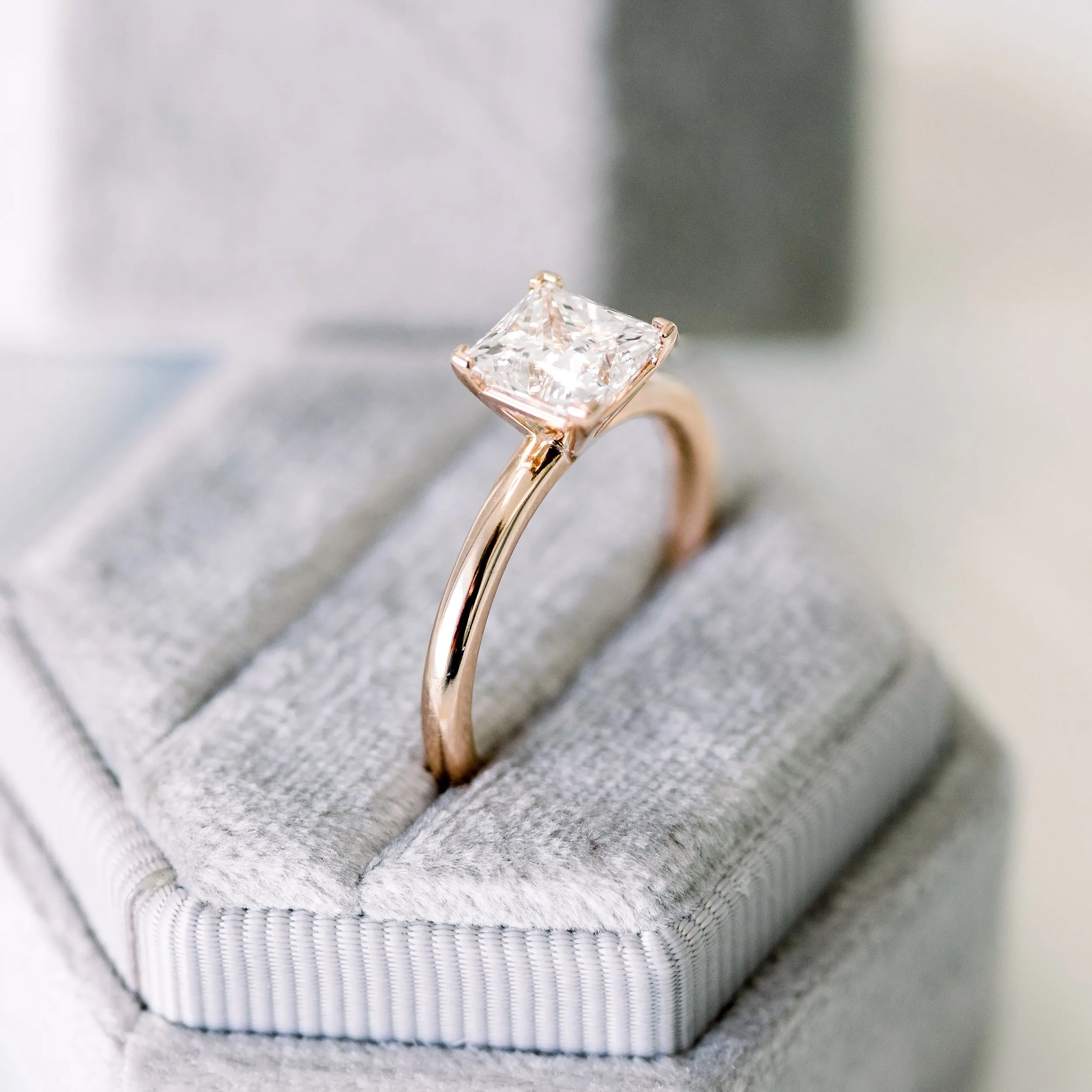 14 Karat Rose Gold Princess Petite Four Prong Solitaire Diamond Engagement Ring featuring 1.5 ct Diamonds