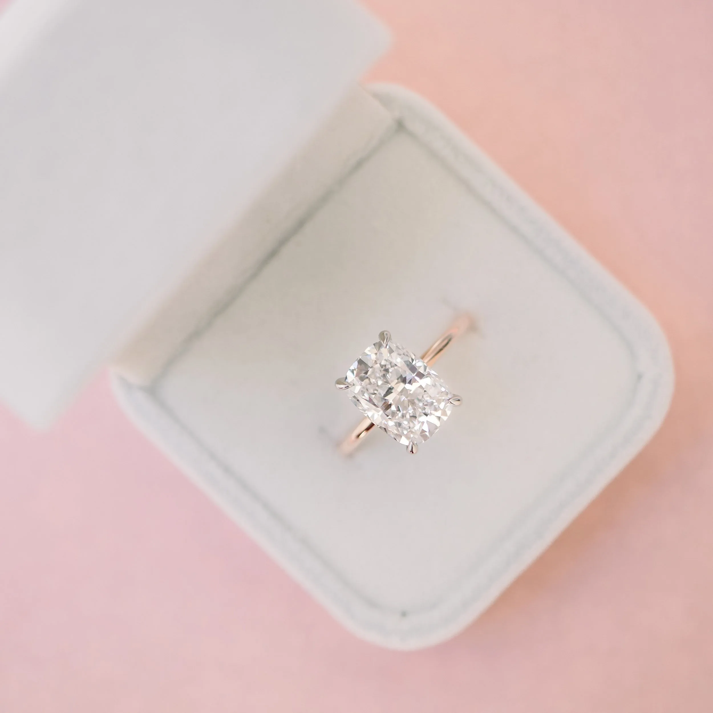 Platinum & Rose Gold Cushion Petite Four Prong Solitaire Diamond Engagement Ring featuring 4.75 Carat Diamonds (Main View)