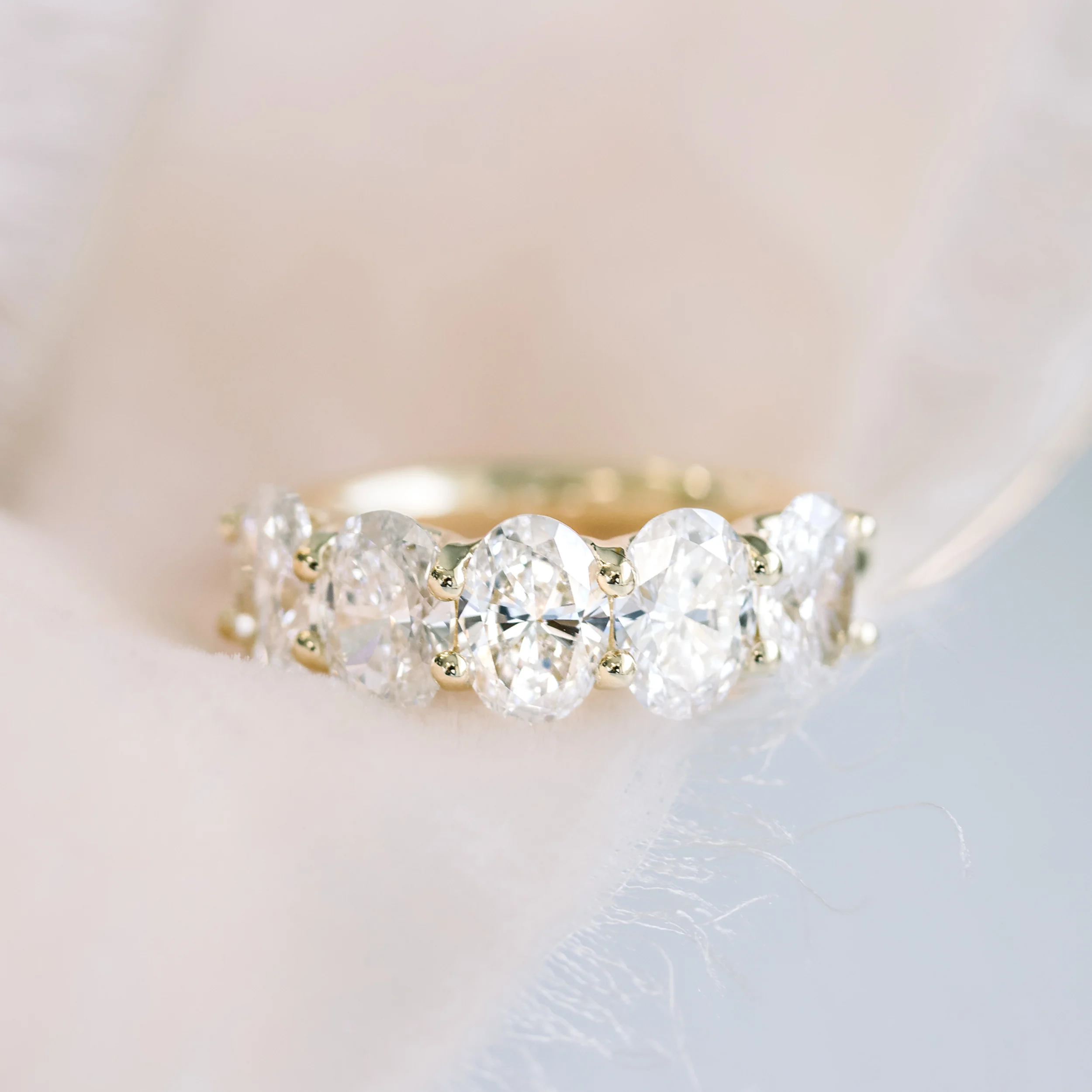 Oval Diamond French U Five Stone Band featuring Synthetic Diamonds (Profile View)