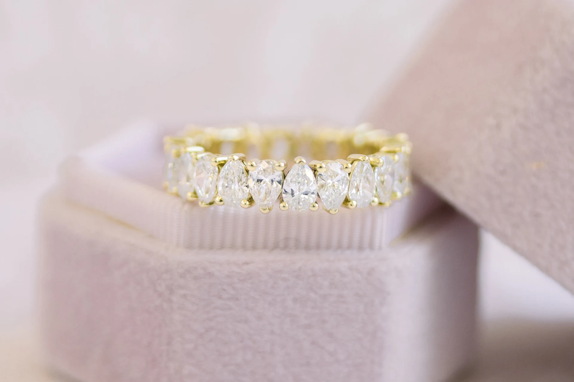 Pear Alternating Eternity Band featuring Lab Created Diamonds (Profile View)