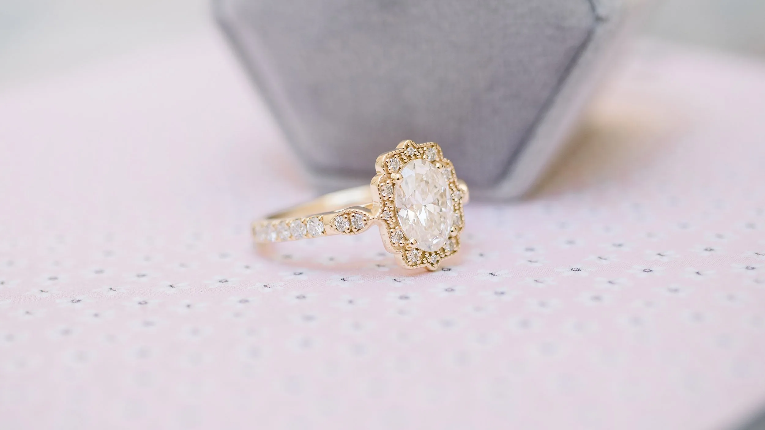 lab created oval diamond in custom yellow gold halo ring