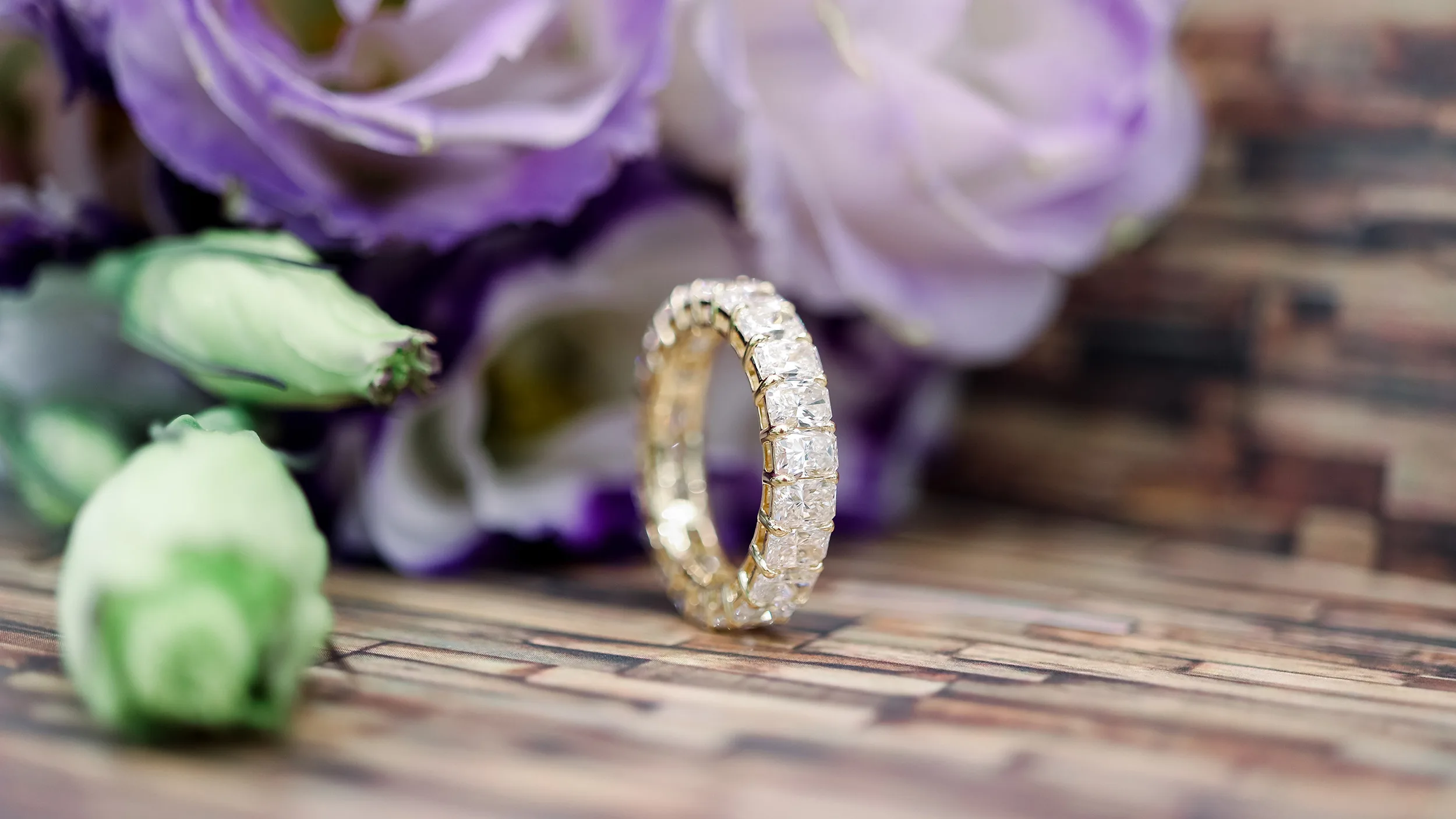 18kt Yellow Gold Radiant Eternity Band featuring 5.7 ctw Diamonds ()