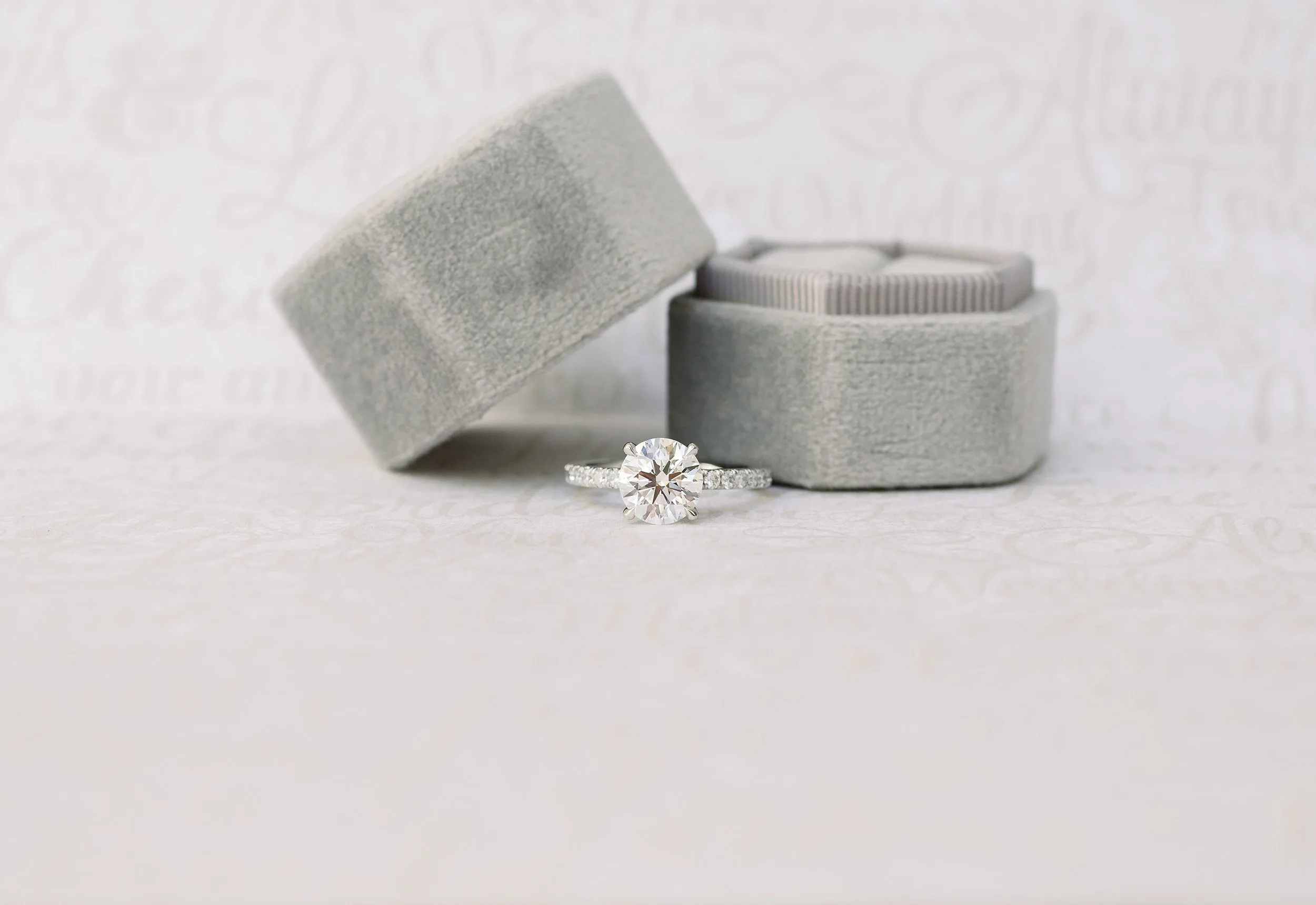 Platinum Round Classic Four Prong Pavé Setting featuring Hand Selected Created Diamonds