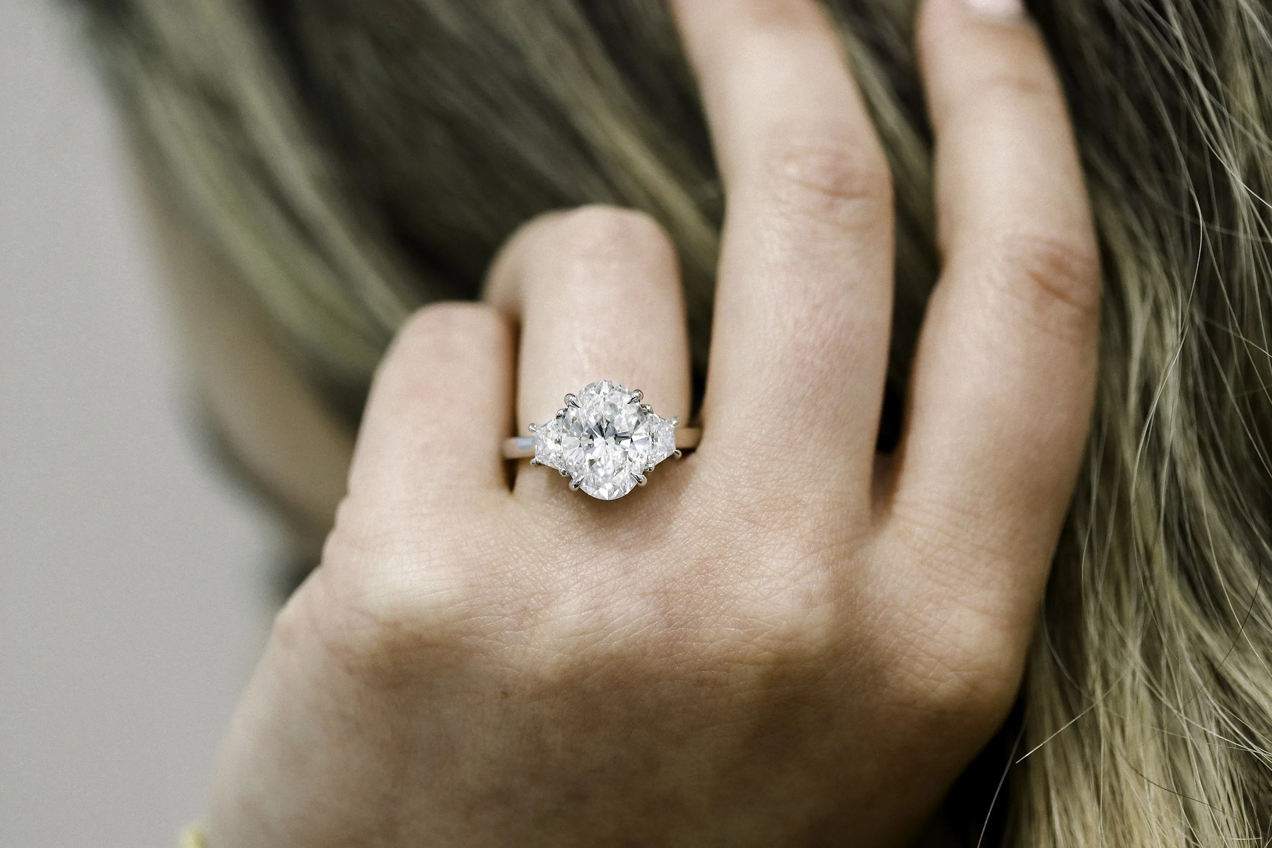 3.5 ct oval and trapezoid three stone manmade diamond engagement  ring platinum ada diamonds design ad278