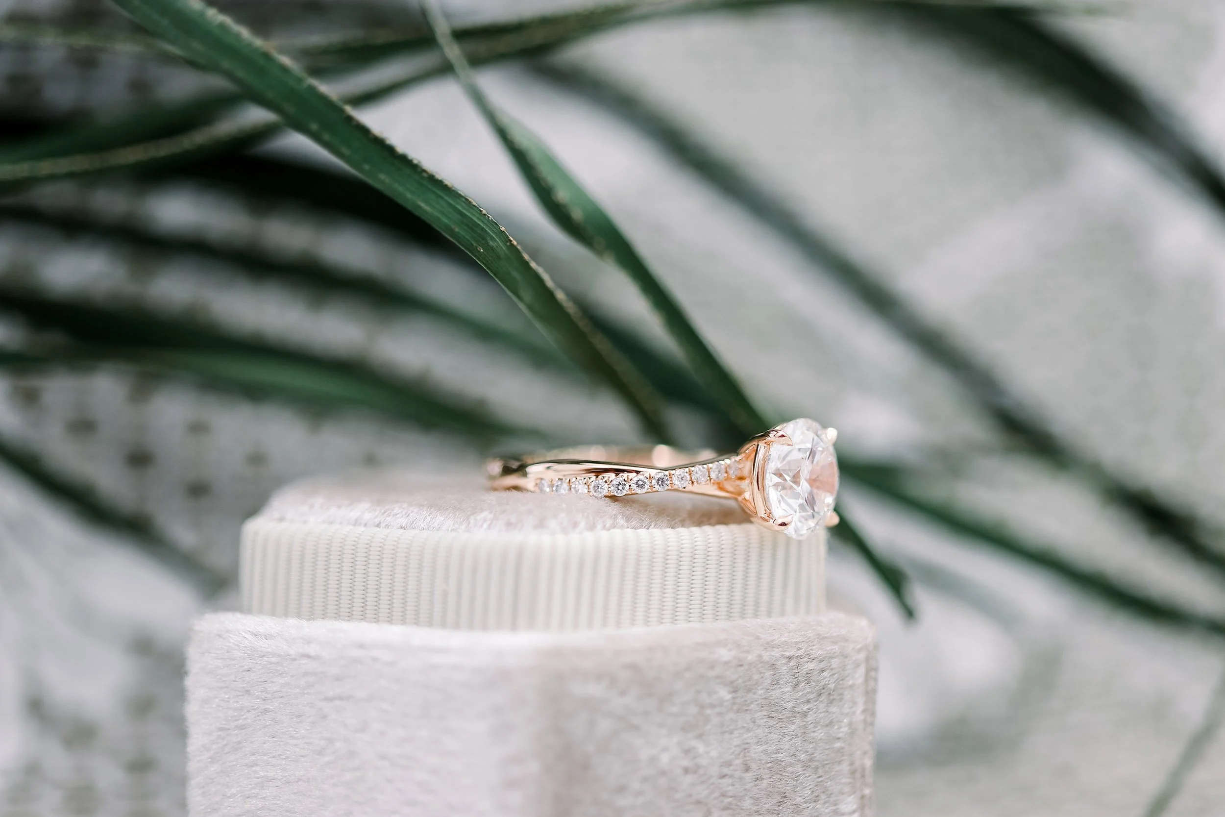 rose gold 1.5 carat round lab diamond ring with twisting diamond band ada diamonds design ad 154