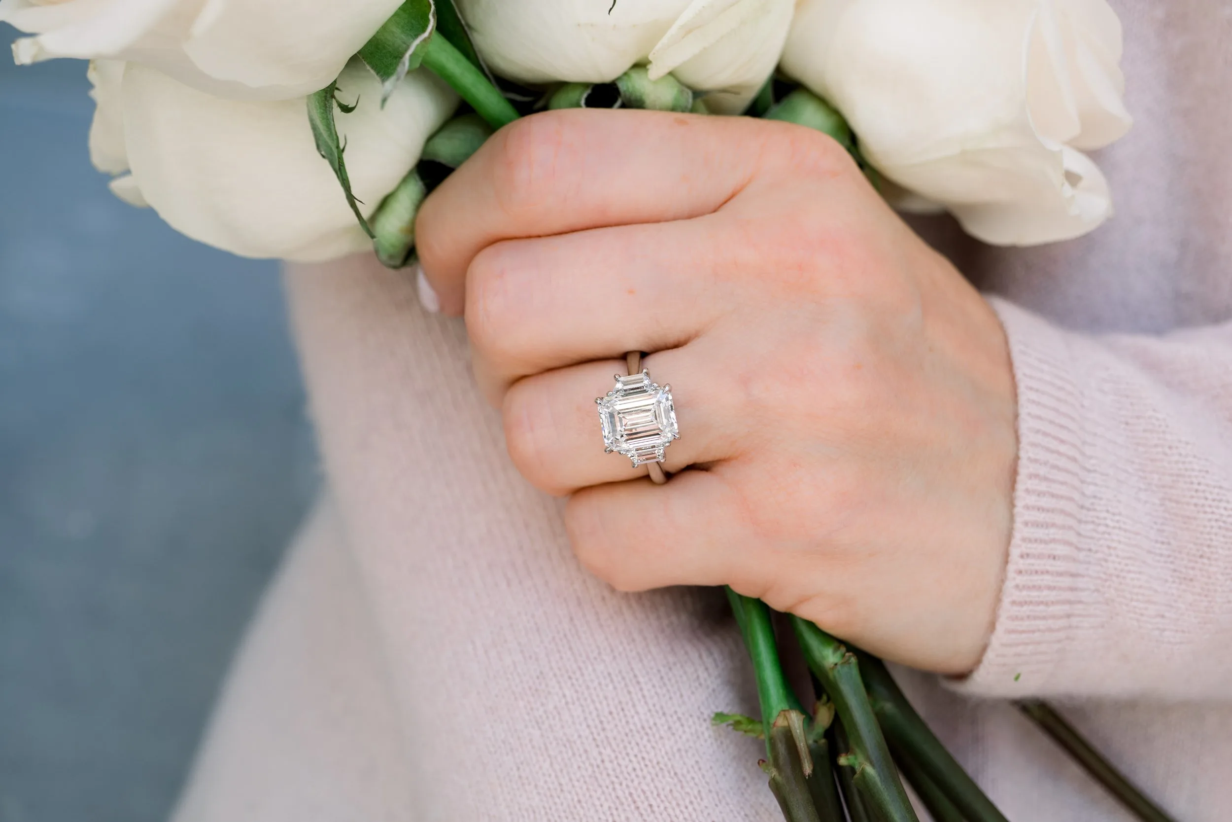 platinum 5 carat emerald cut and trapezoid three stone lab diamond ring ada diamonds design ad 465 on model