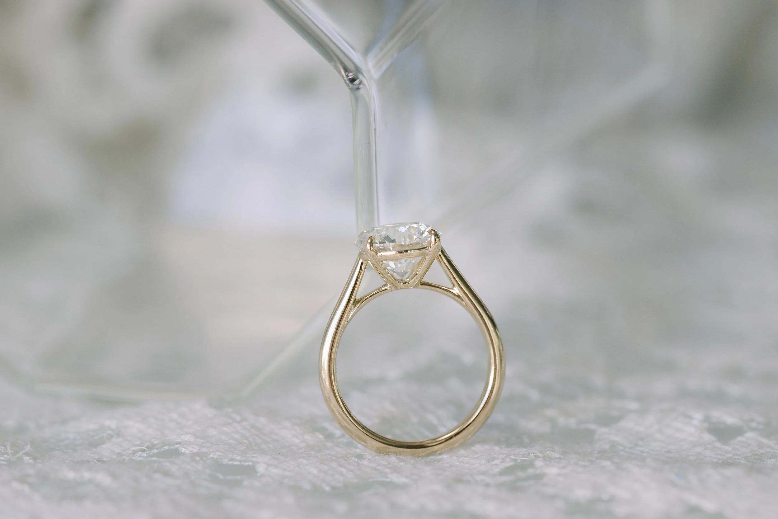14k yellow gold cathedral solitaire