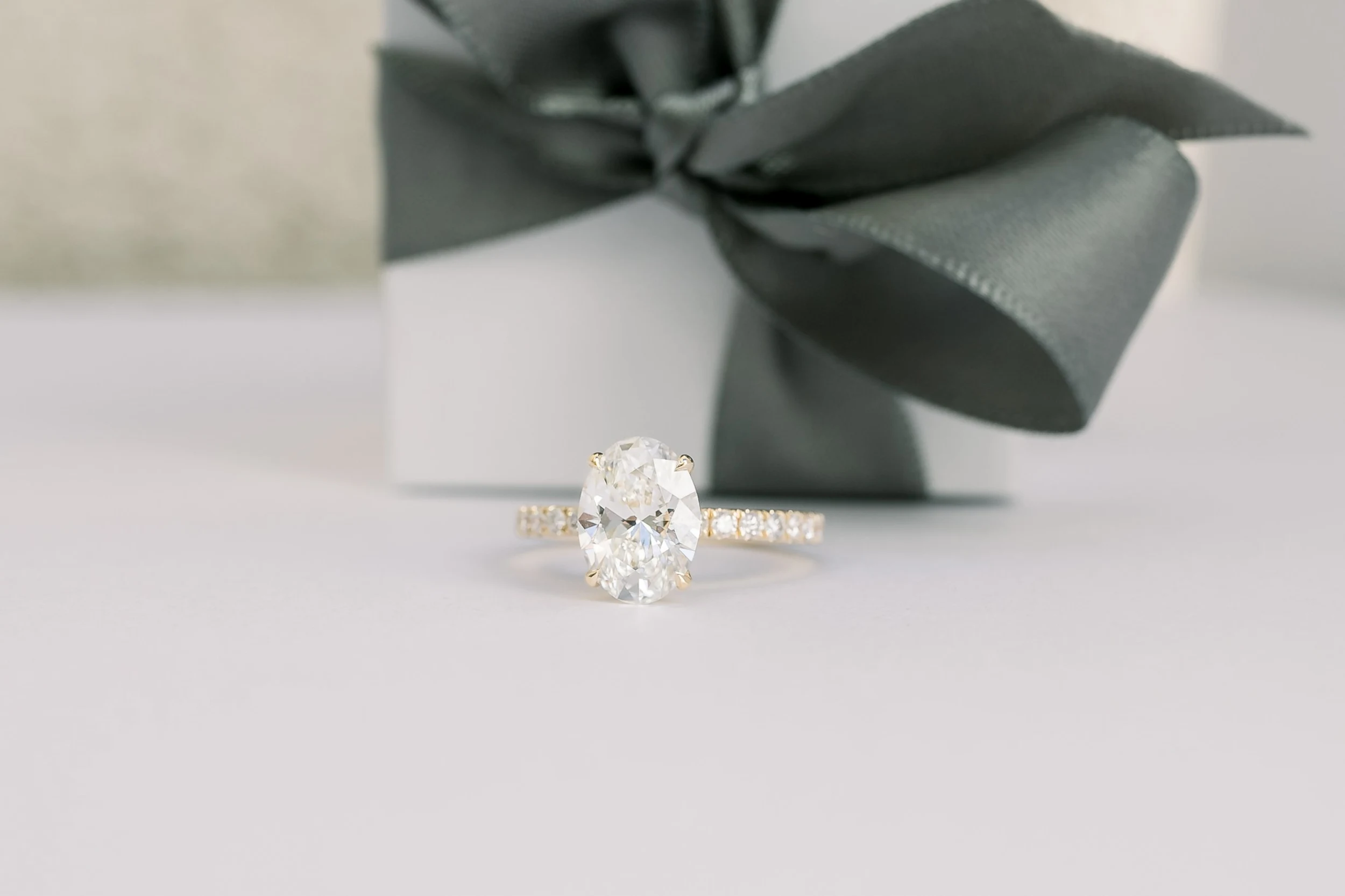 18k yellow gold 2.25 carat oval lab diamond engagement ring with pavé diamond band ada diamonds design ad-230