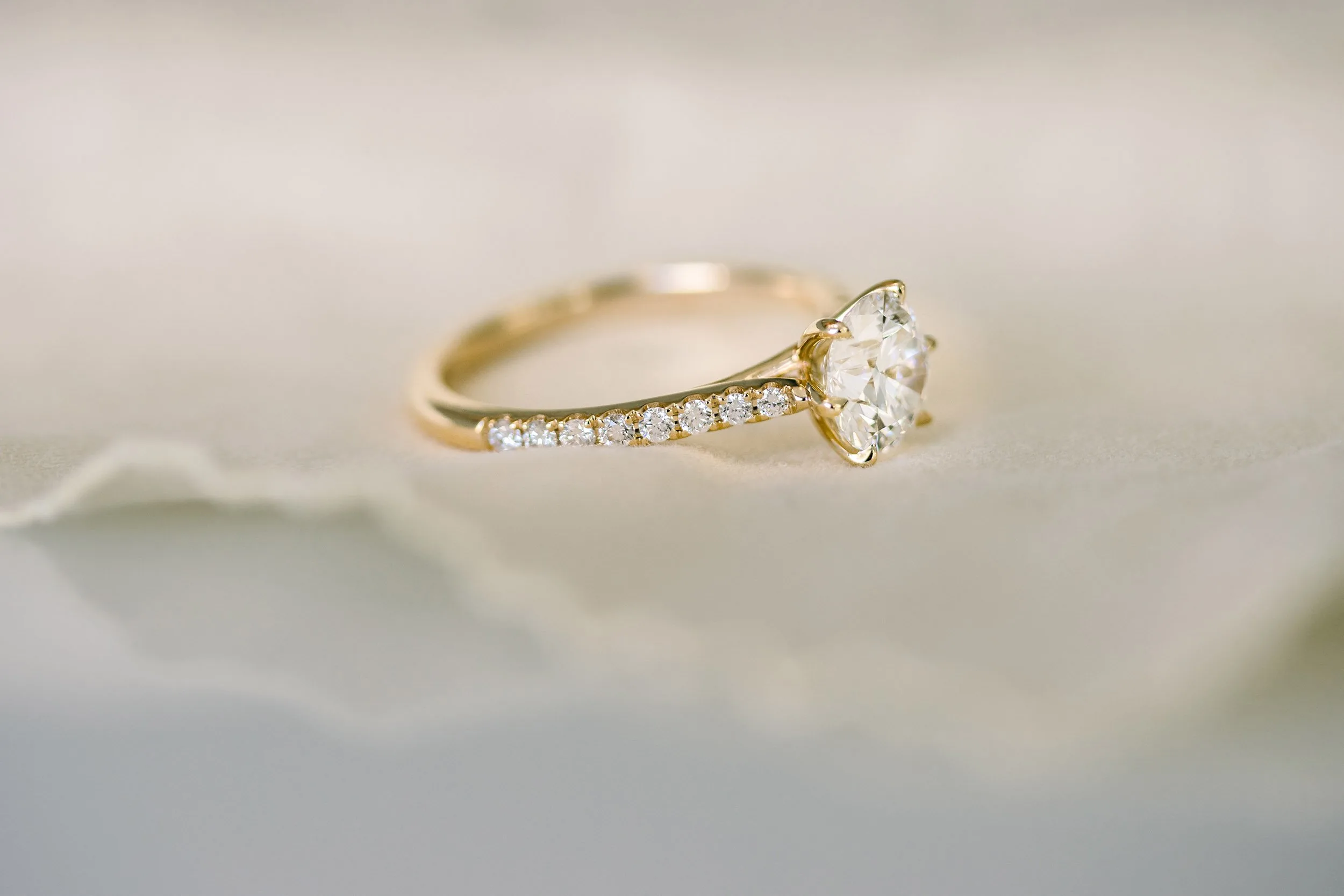 yellow gold six prong trellis pave engagement ring